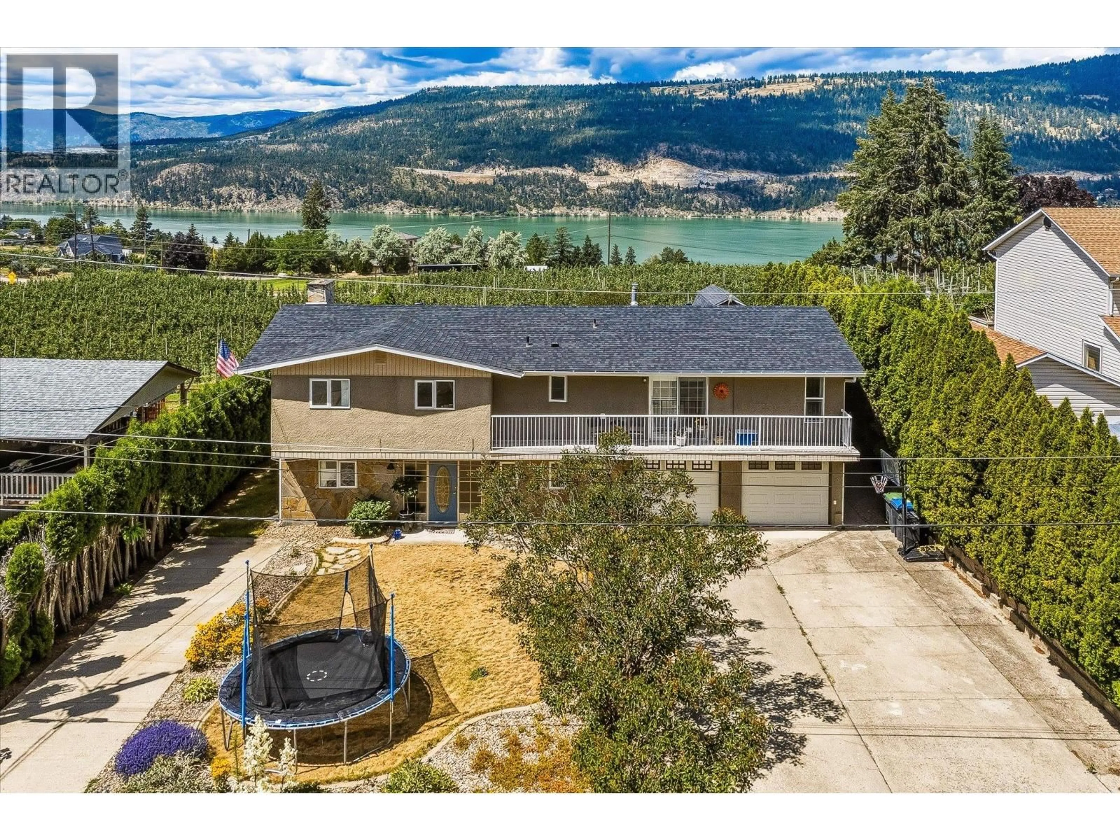 A pic from outside/outdoor area/front of a property/back of a property/a pic from drone, water/lake/river/ocean view for 14262 HARMEN ROAD, Lake Country British Columbia V4V2B9