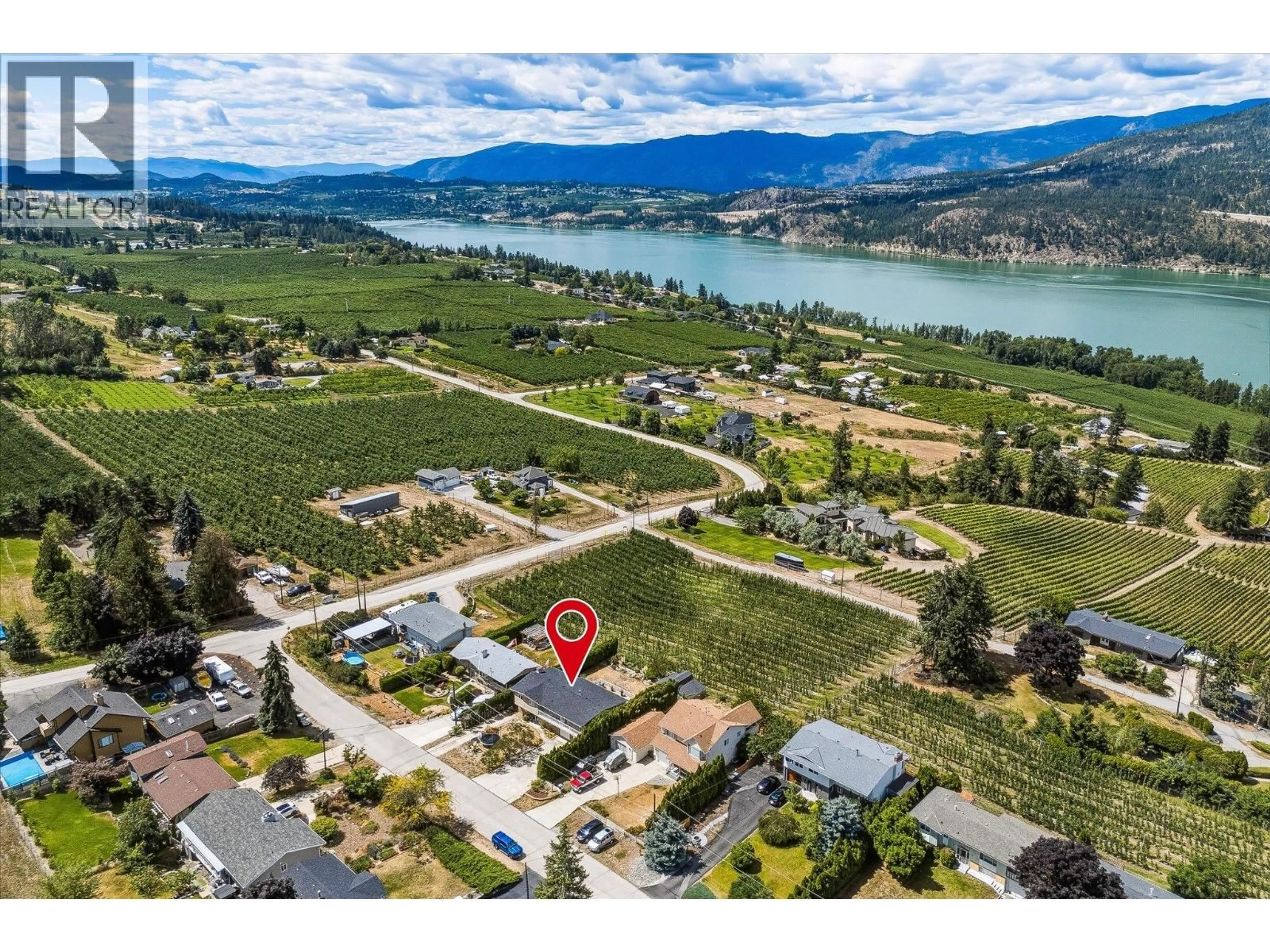 A pic from outside/outdoor area/front of a property/back of a property/a pic from drone, water/lake/river/ocean view for 14262 HARMEN ROAD, Lake Country British Columbia V4V2B9