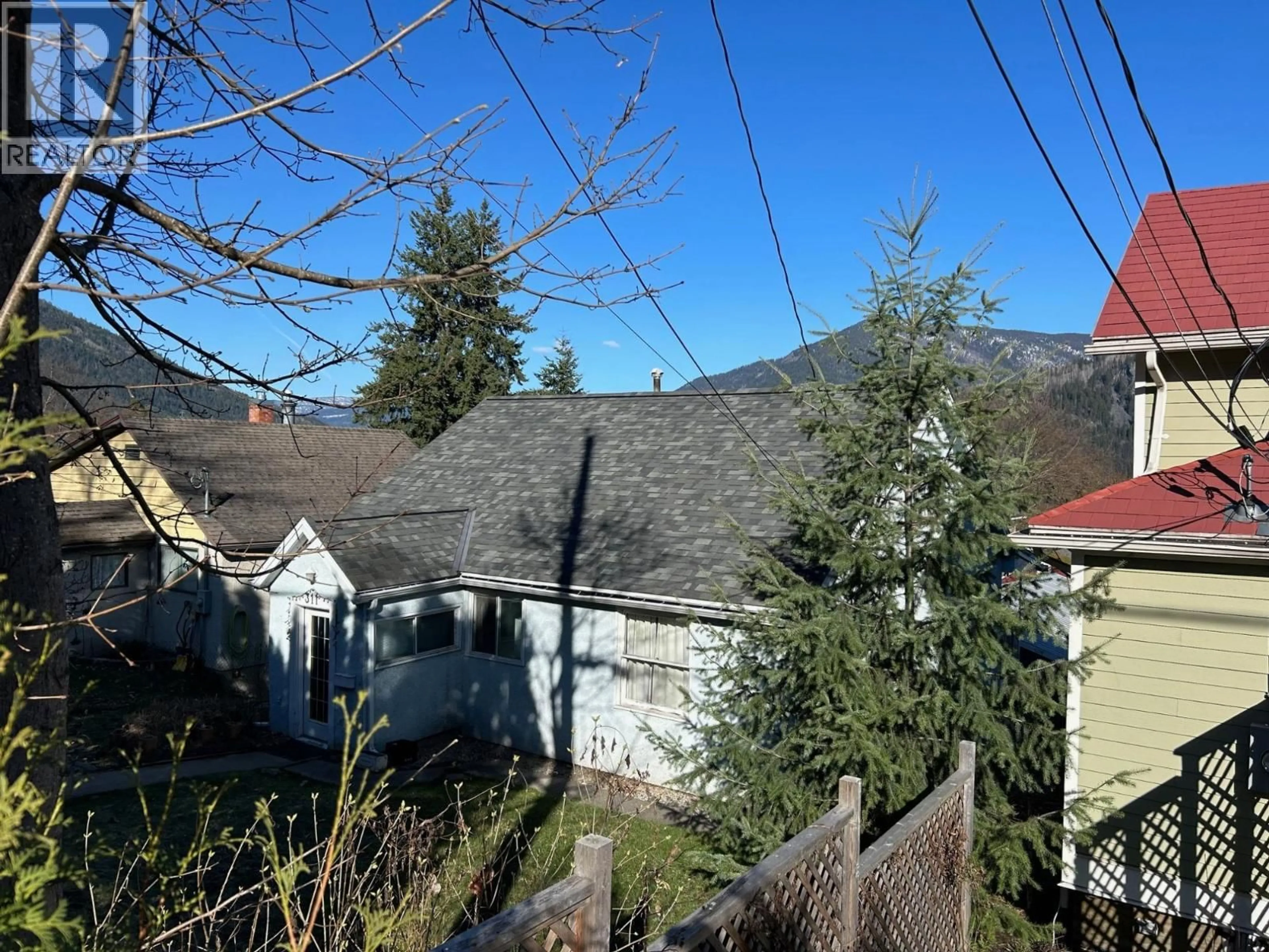 A pic from outside/outdoor area/front of a property/back of a property/a pic from drone, street for 311 GORE STREET, Nelson British Columbia V1L5B8