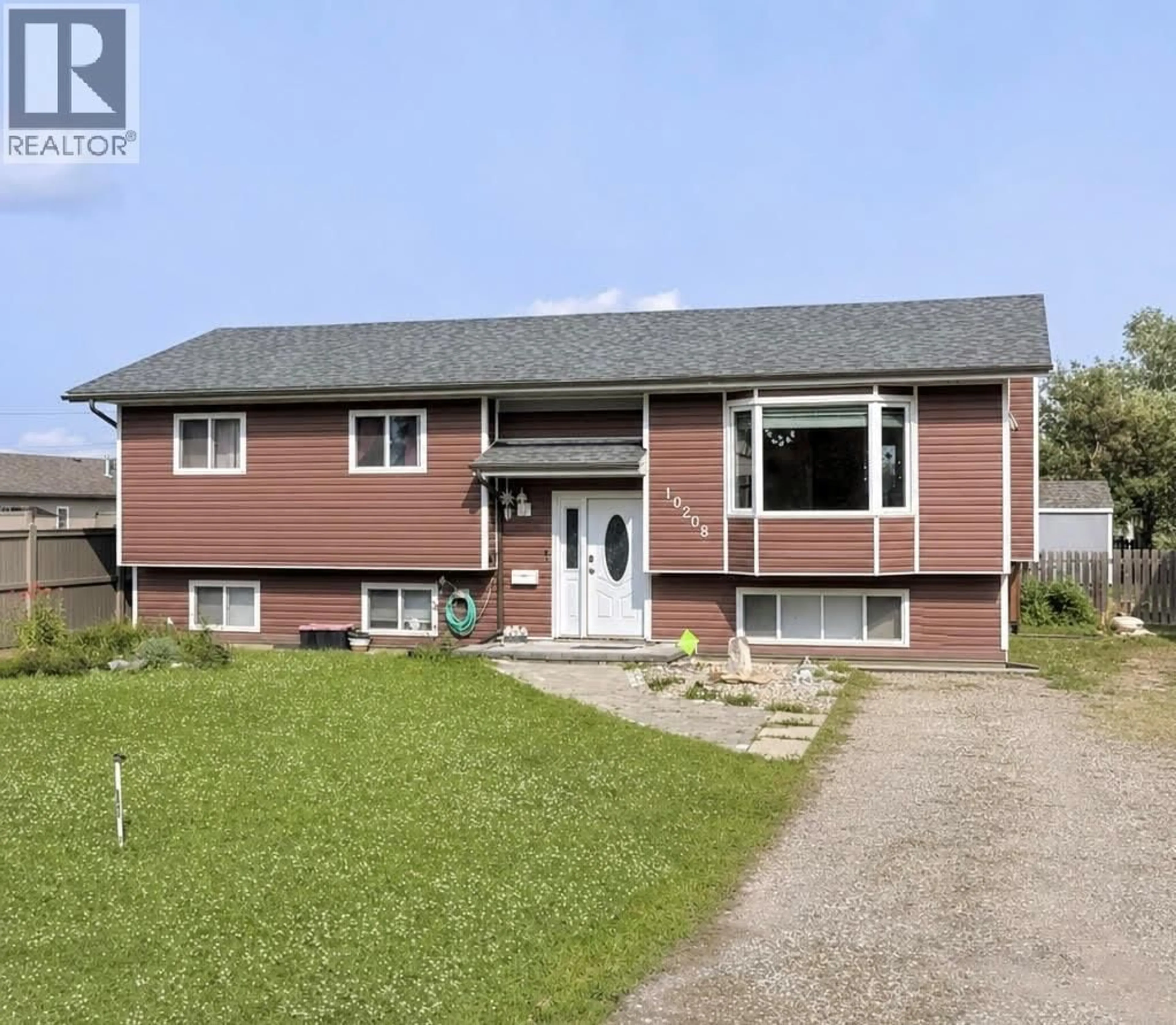 A pic from outside/outdoor area/front of a property/back of a property/a pic from drone, unknown for 10208 18 STREET, Dawson Creek British Columbia V1G4E1