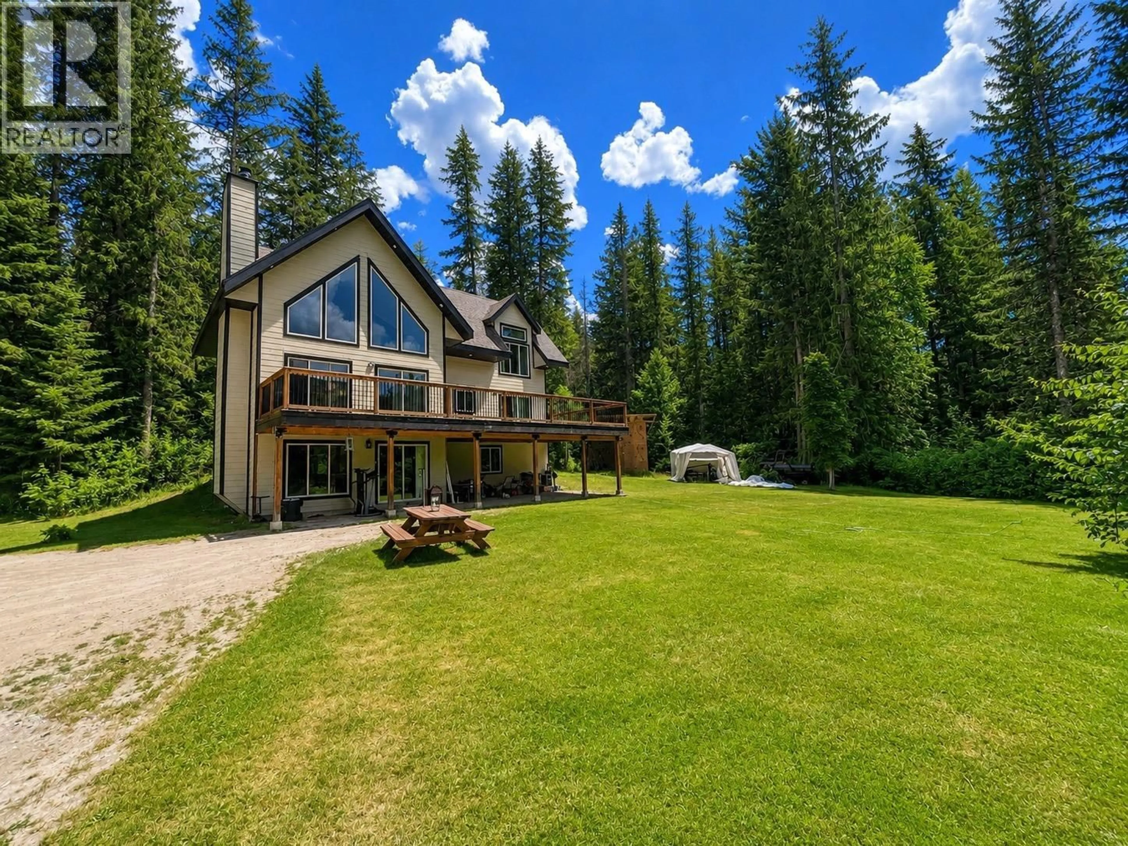 A pic from outside/outdoor area/front of a property/back of a property/a pic from drone, mountain view for 7475 6 HIGHWAY, Winlaw British Columbia V0G2J0