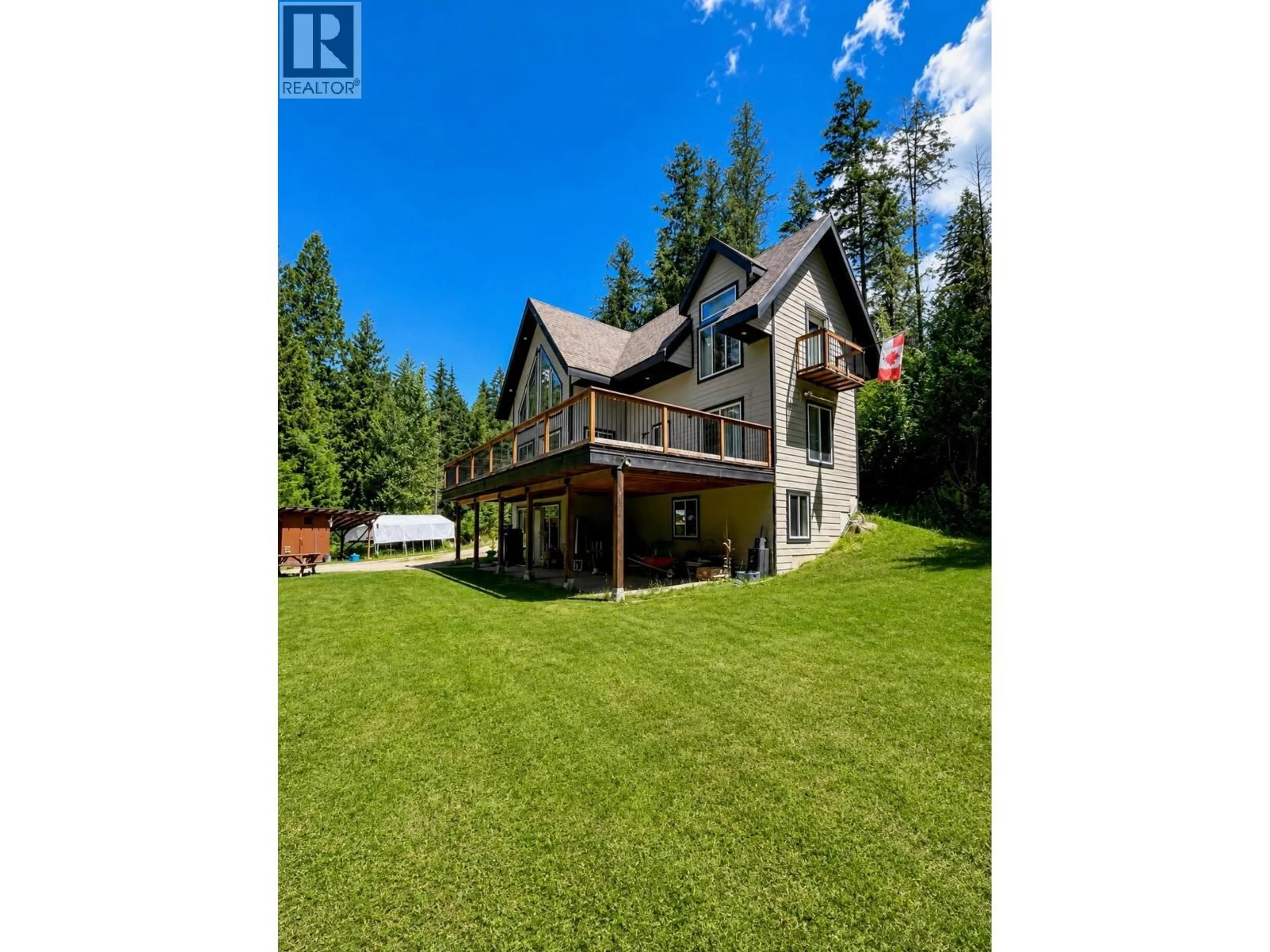 A pic from outside/outdoor area/front of a property/back of a property/a pic from drone, water/lake/river/ocean view for 7475 6 HIGHWAY, Winlaw British Columbia V0G2J0