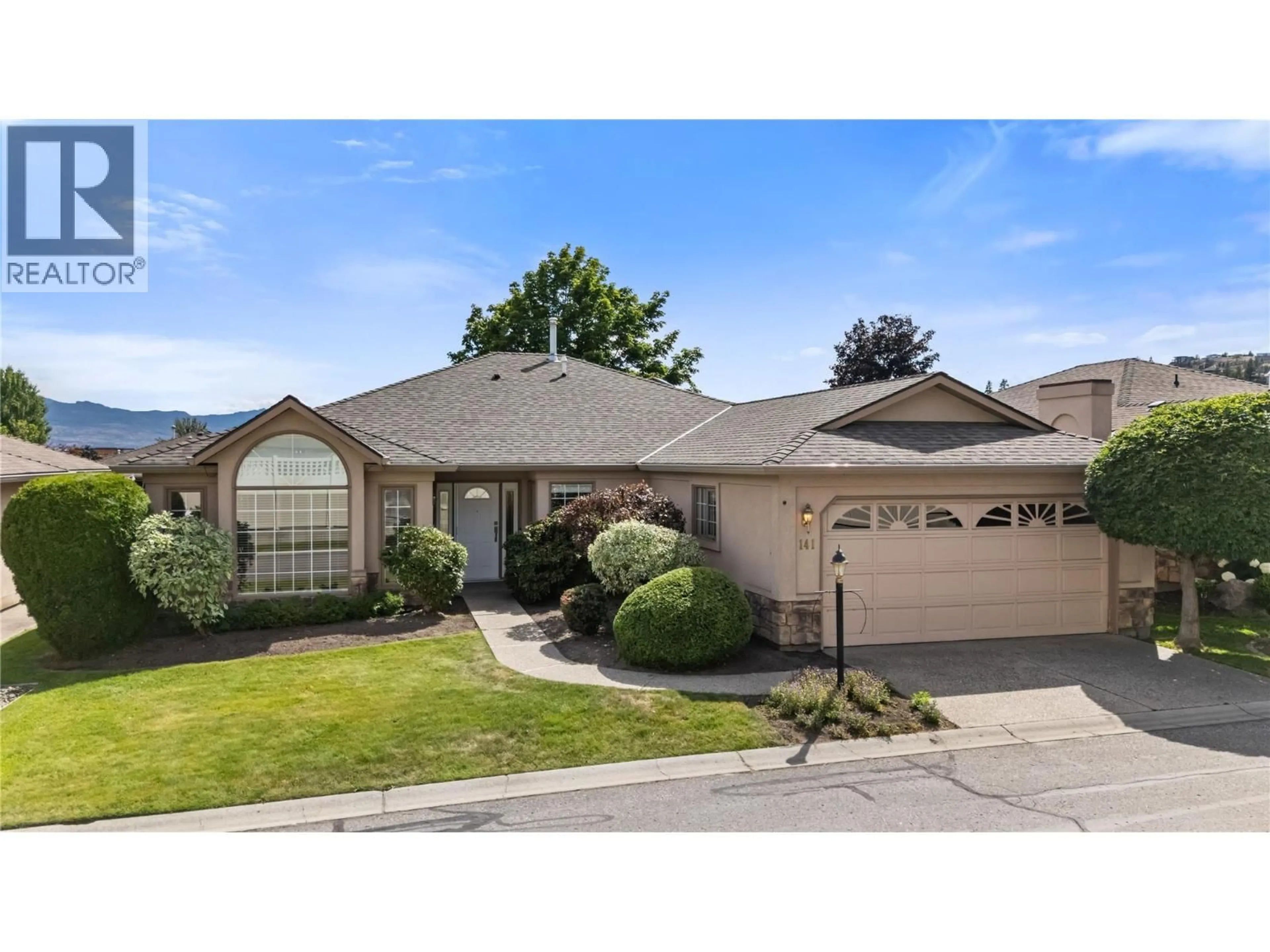 Home with vinyl exterior material, street for 141 - 595 YATES ROAD, Kelowna British Columbia V1V1P8
