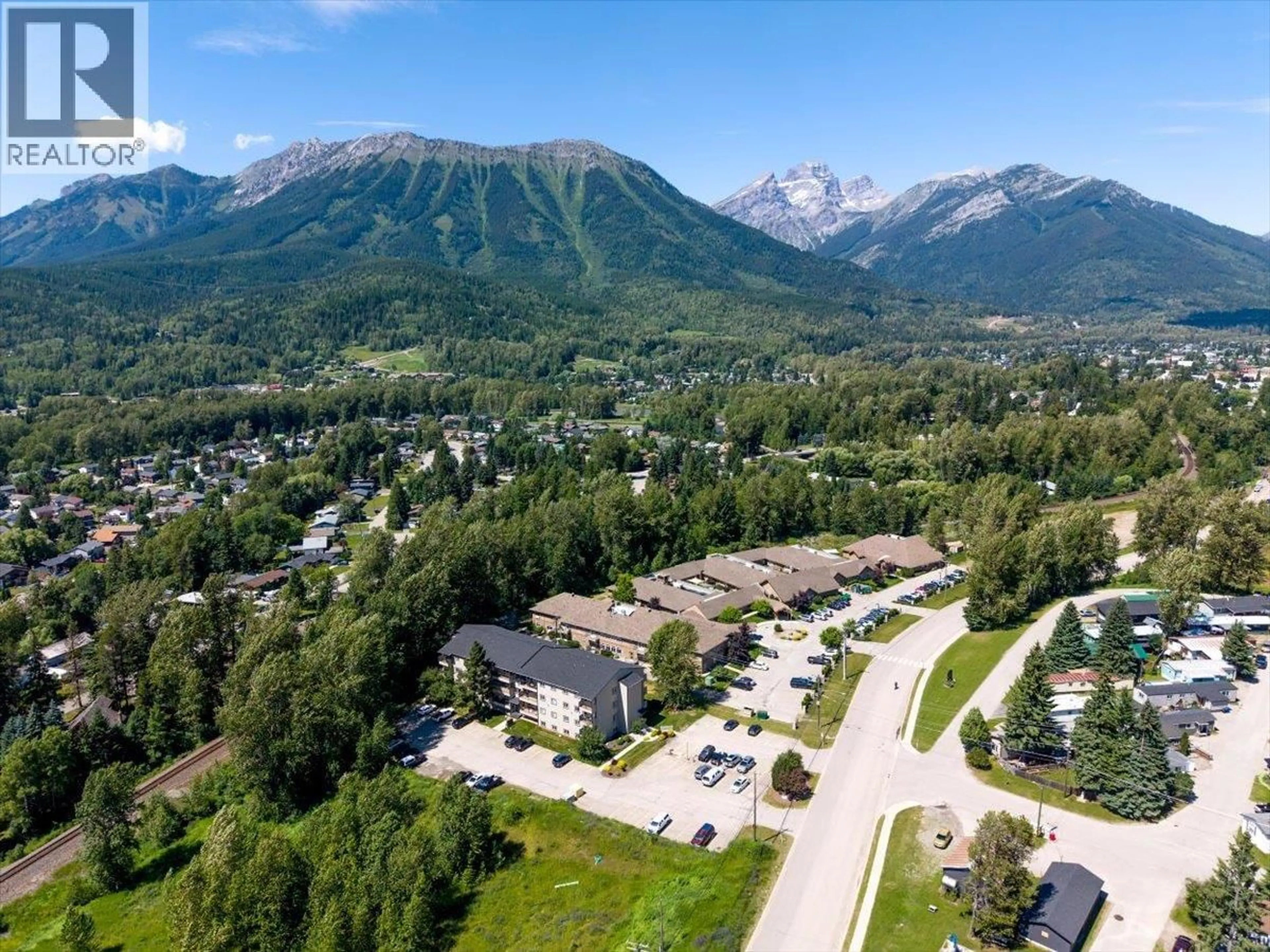 A pic from outside/outdoor area/front of a property/back of a property/a pic from drone, mountain view for 209 - 65 COKATO ROAD, Fernie British Columbia V0B1M4