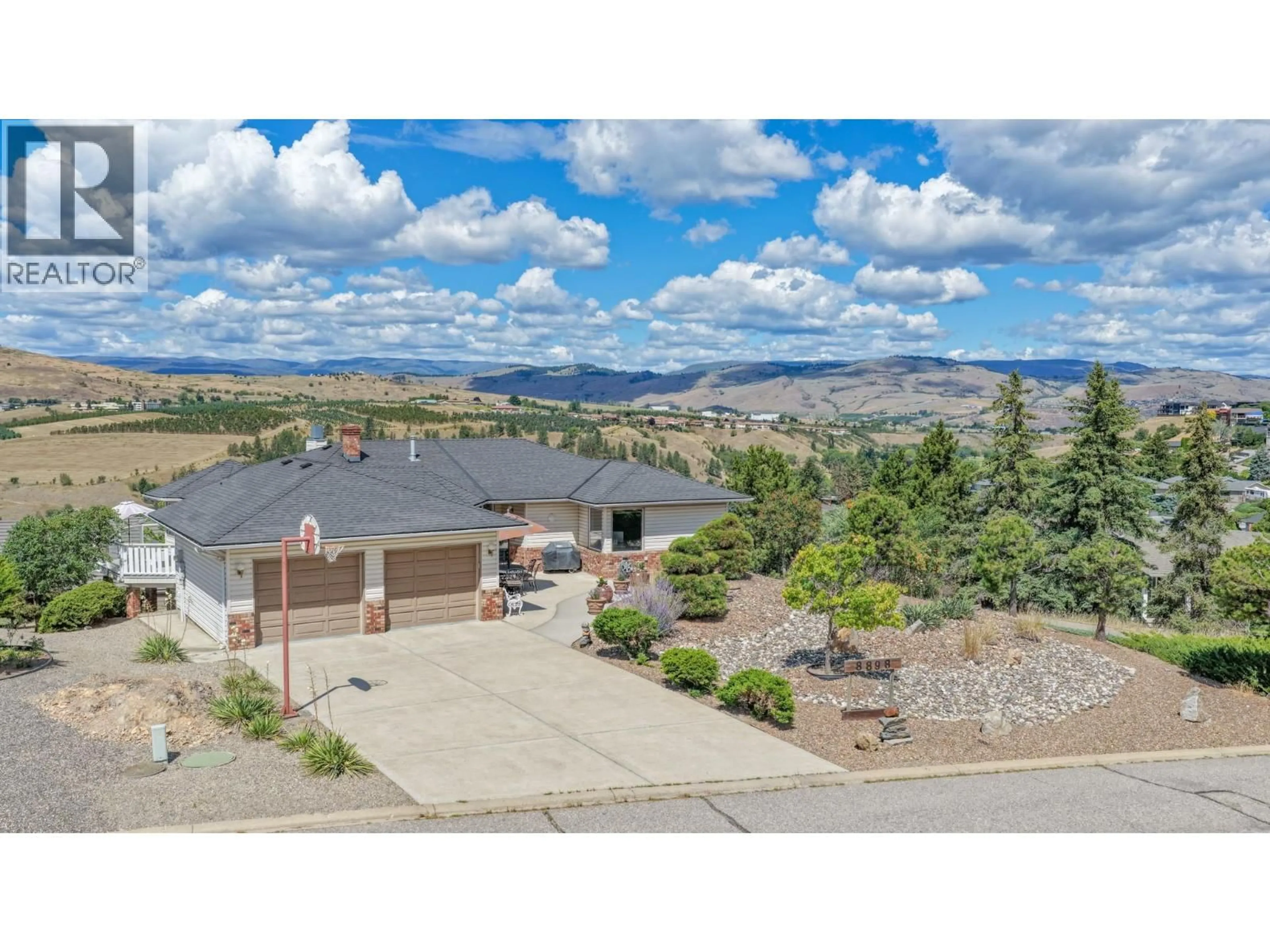 A pic from outside/outdoor area/front of a property/back of a property/a pic from drone, mountain view for 8898 MICHAEL DRIVE, Coldstream British Columbia V1B2B9