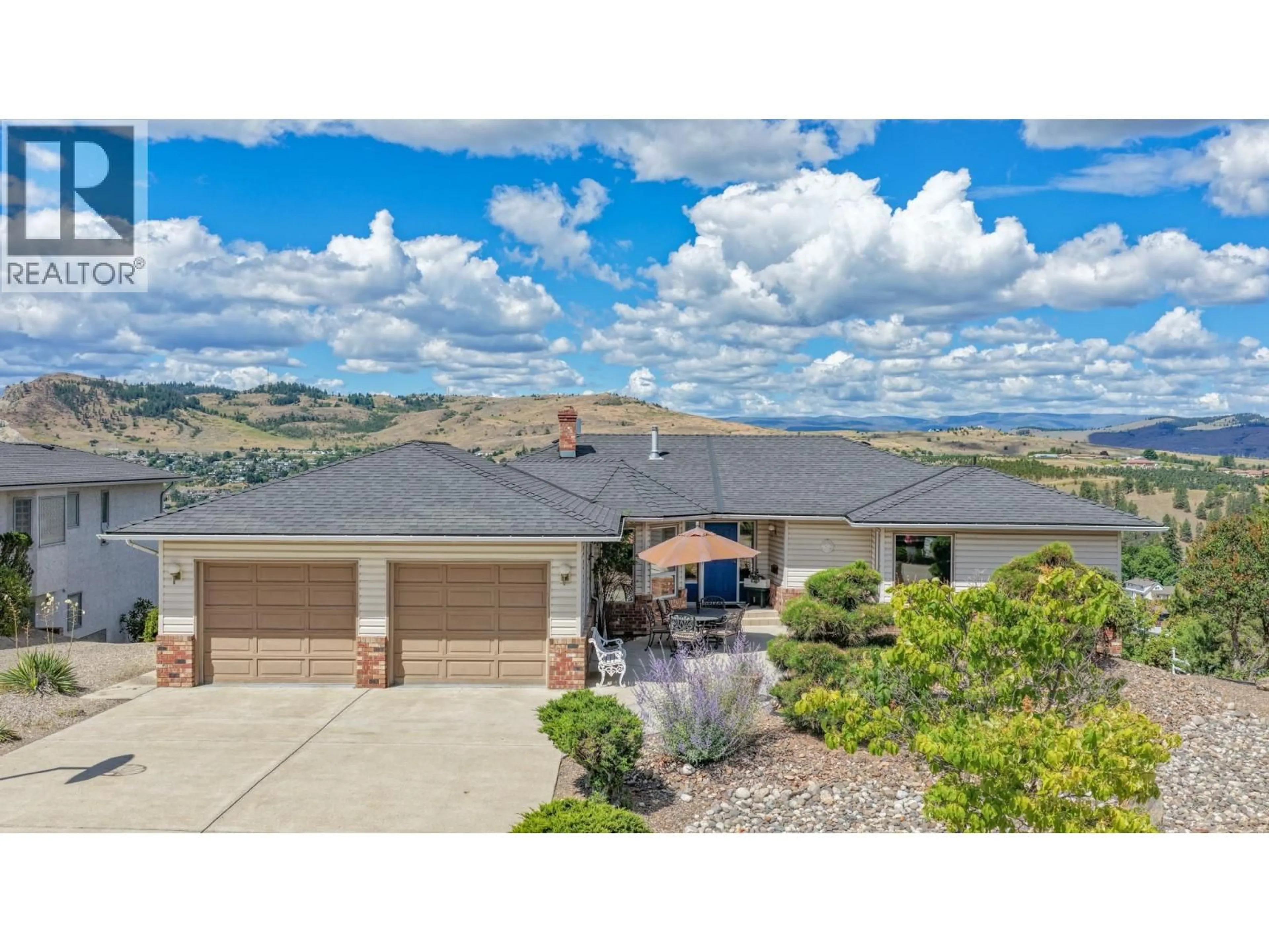A pic from outside/outdoor area/front of a property/back of a property/a pic from drone, mountain view for 8898 MICHAEL DRIVE, Coldstream British Columbia V1B2B9