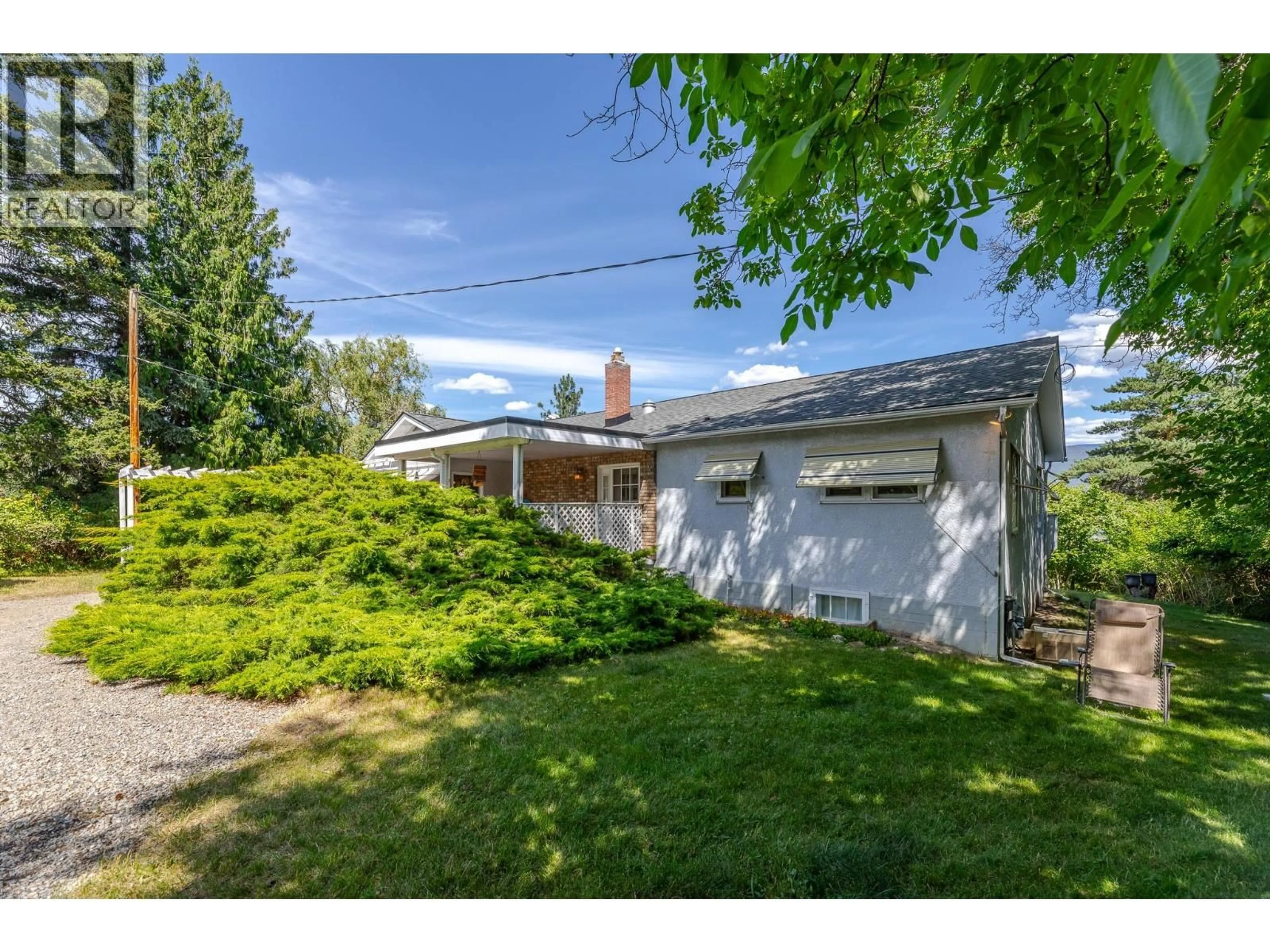 A pic from outside/outdoor area/front of a property/back of a property/a pic from drone, street for 7508 SWITCHBACK ROAD, Summerland British Columbia V0H1Z6