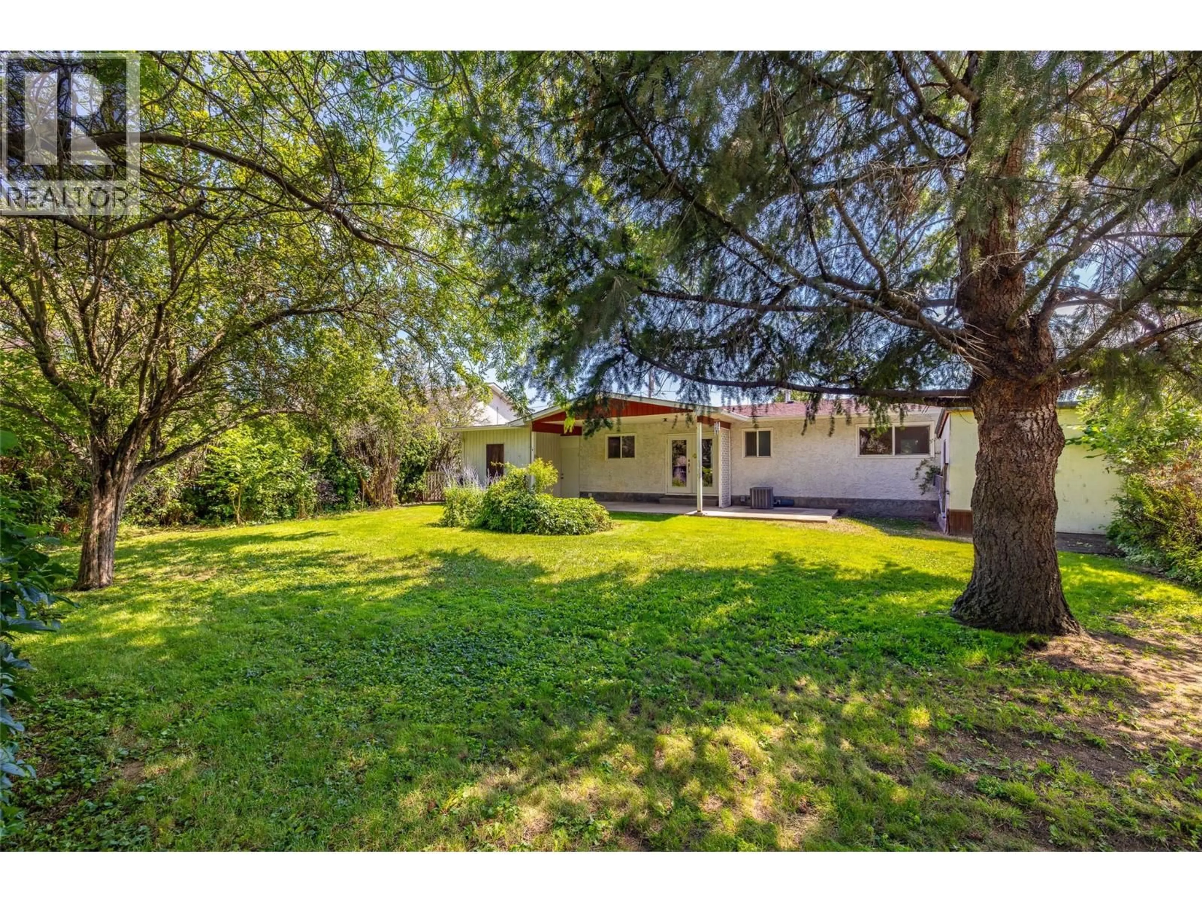 A pic from outside/outdoor area/front of a property/back of a property/a pic from drone, unknown for 300 PATTERSON ROAD, Kelowna British Columbia V1X2L2