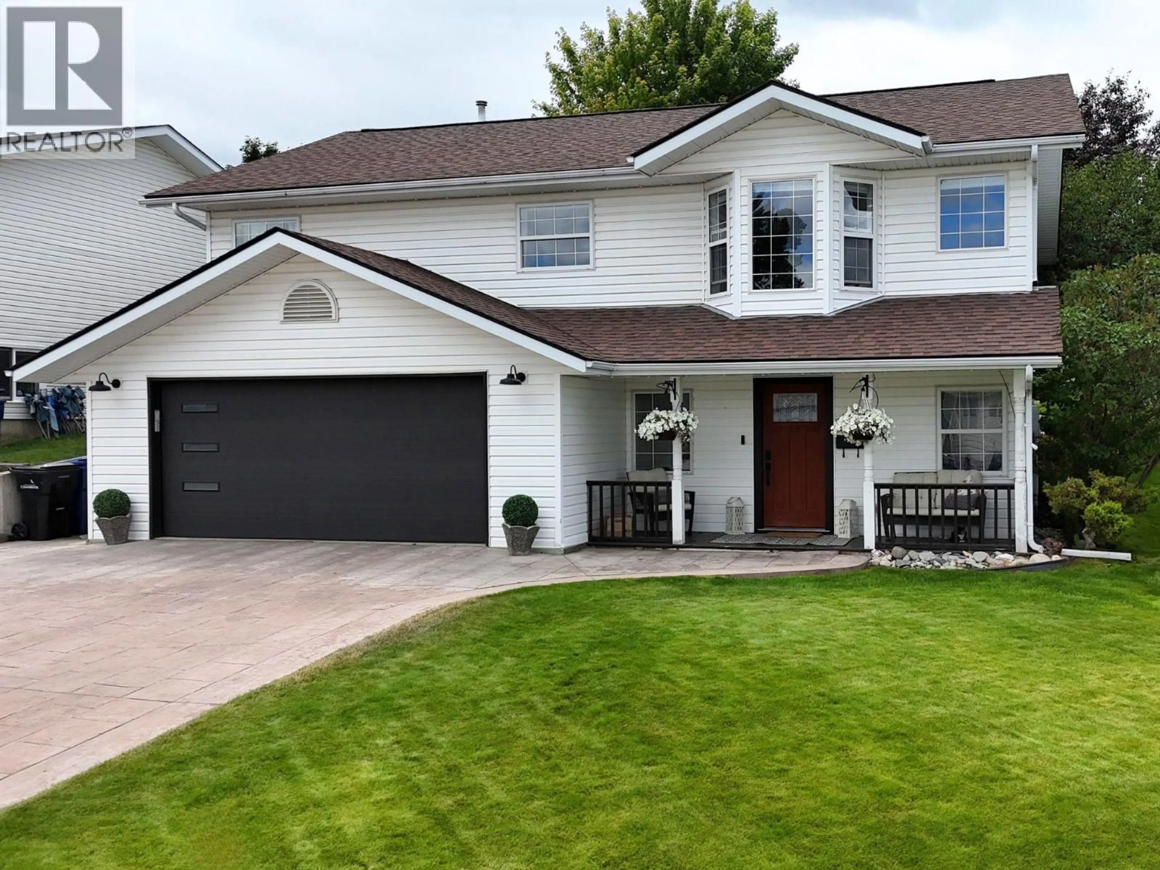 Home with vinyl exterior material, street for 1405 20A STREET SOUTH, Cranbrook British Columbia V1C6L7