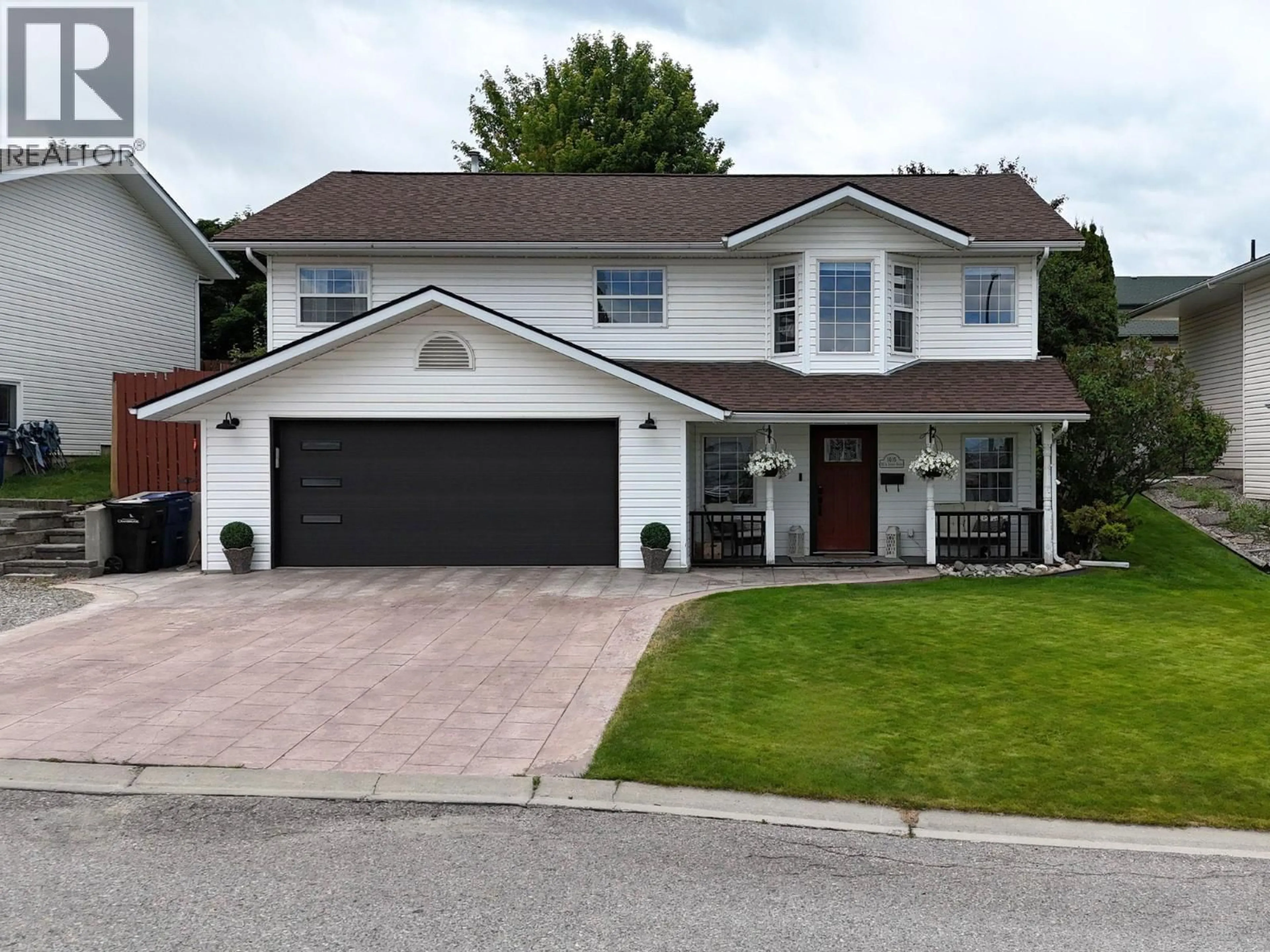 Home with vinyl exterior material, street for 1405 20A STREET SOUTH, Cranbrook British Columbia V1C6L7