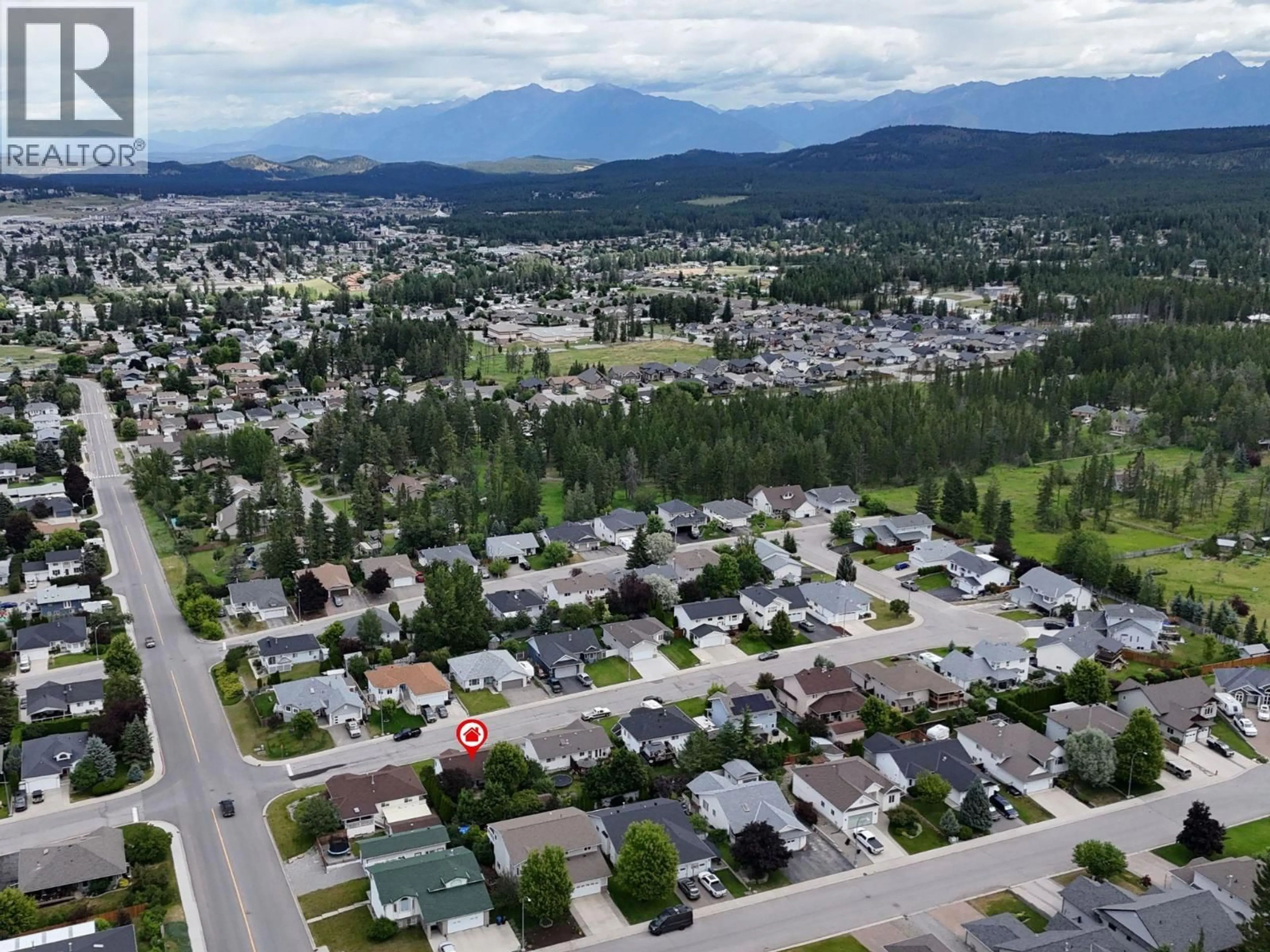 A pic from outside/outdoor area/front of a property/back of a property/a pic from drone, mountain view for 1405 20A STREET SOUTH, Cranbrook British Columbia V1C6L7