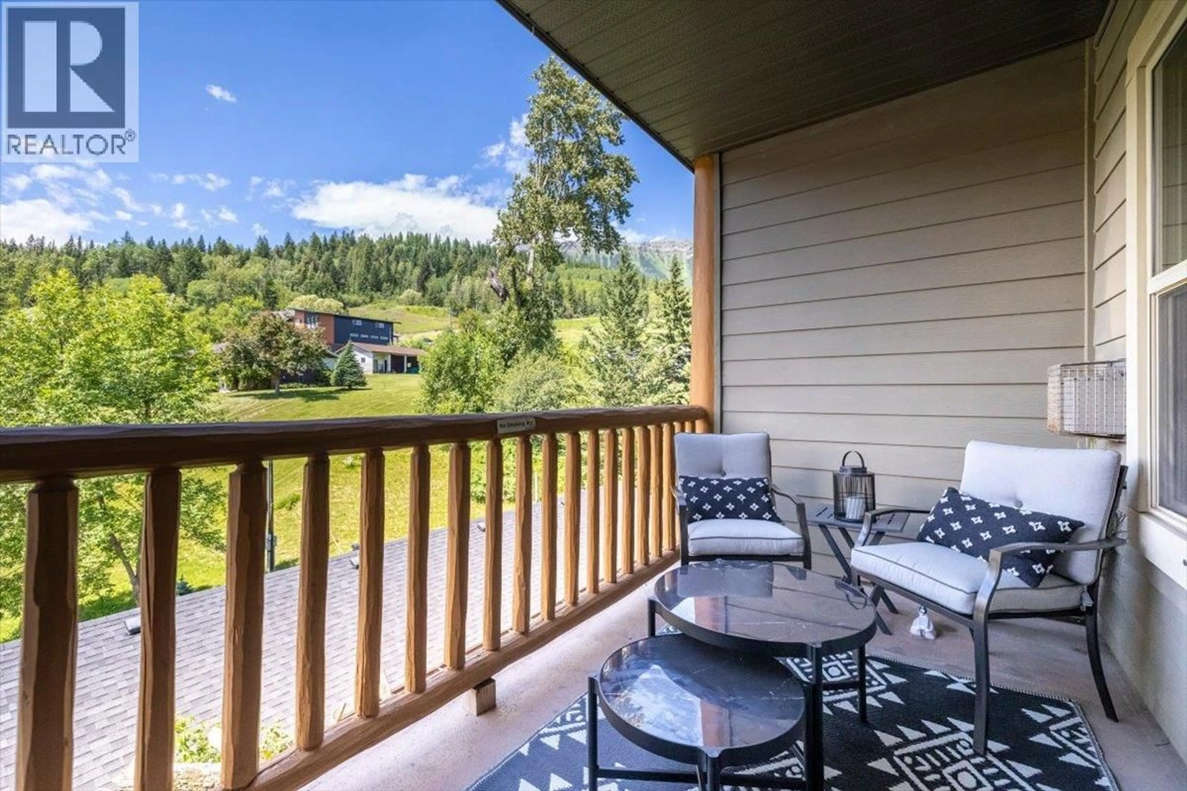 Patio, water/lake/river/ocean view for 302 - 1500 MCDONALD AVENUE, Fernie British Columbia V0B1M3