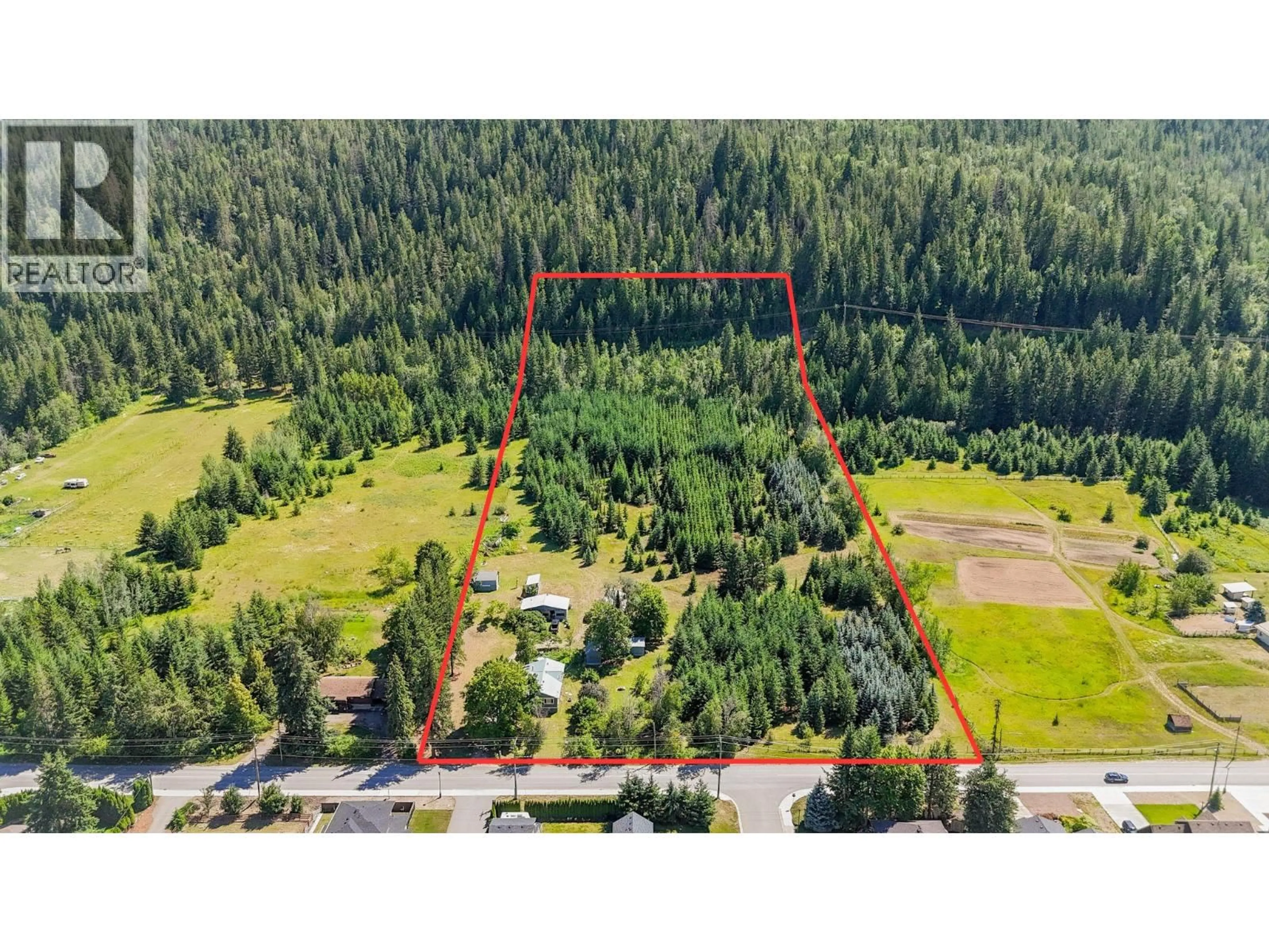 A pic from outside/outdoor area/front of a property/back of a property/a pic from drone, forest/trees view for 1370 20 AVENUE SOUTHEAST, Salmon Arm British Columbia V1E2C9