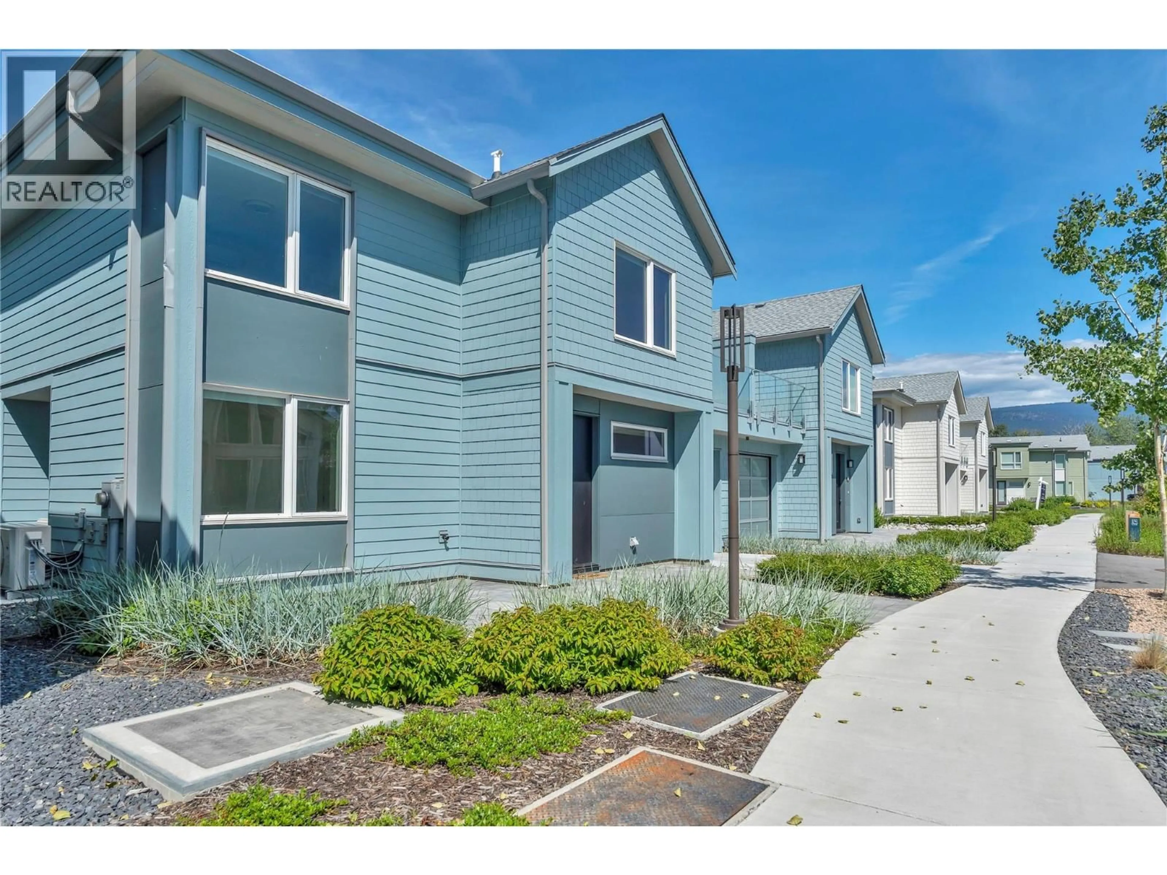 Home with vinyl exterior material, street for 3120 LANDRY CRESCENT, Summerland British Columbia V0H1Z9