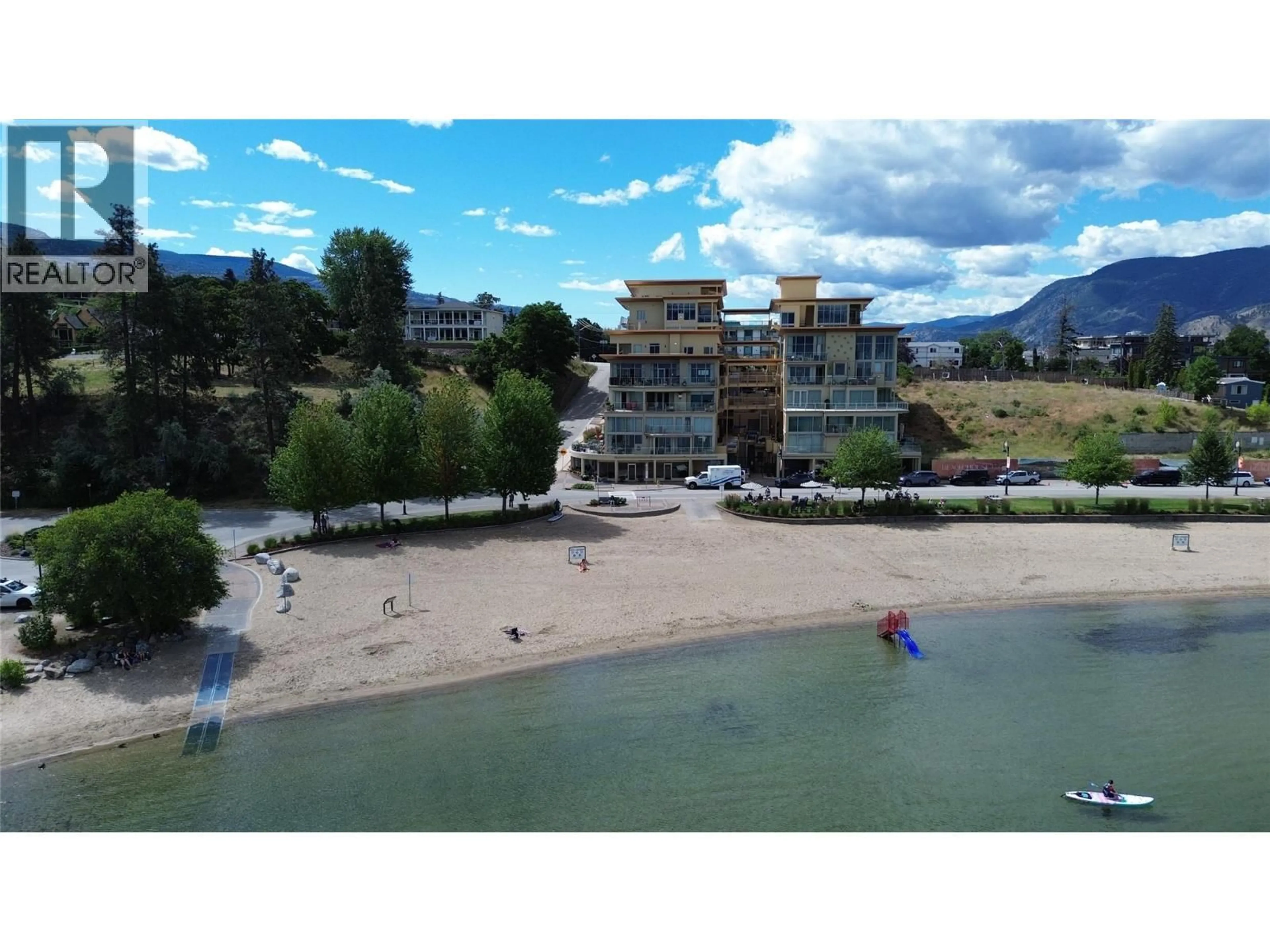 A pic from outside/outdoor area/front of a property/back of a property/a pic from drone, water/lake/river/ocean view for 103 - 250 MARINA WAY, Penticton British Columbia V2A1H4