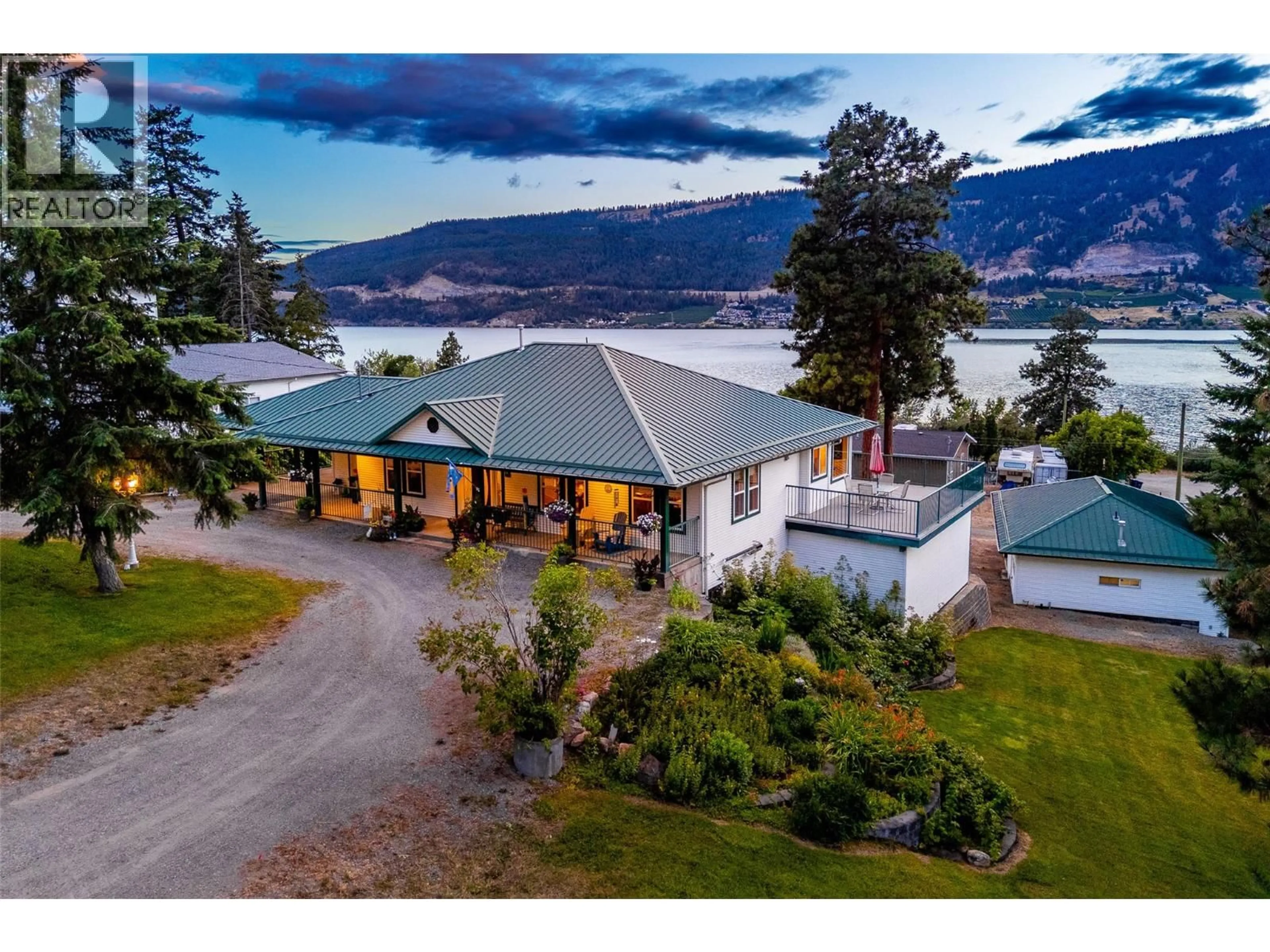 A pic from outside/outdoor area/front of a property/back of a property/a pic from drone, water/lake/river/ocean view for 15326 OYAMA ROAD, Lake Country British Columbia V4V2C5