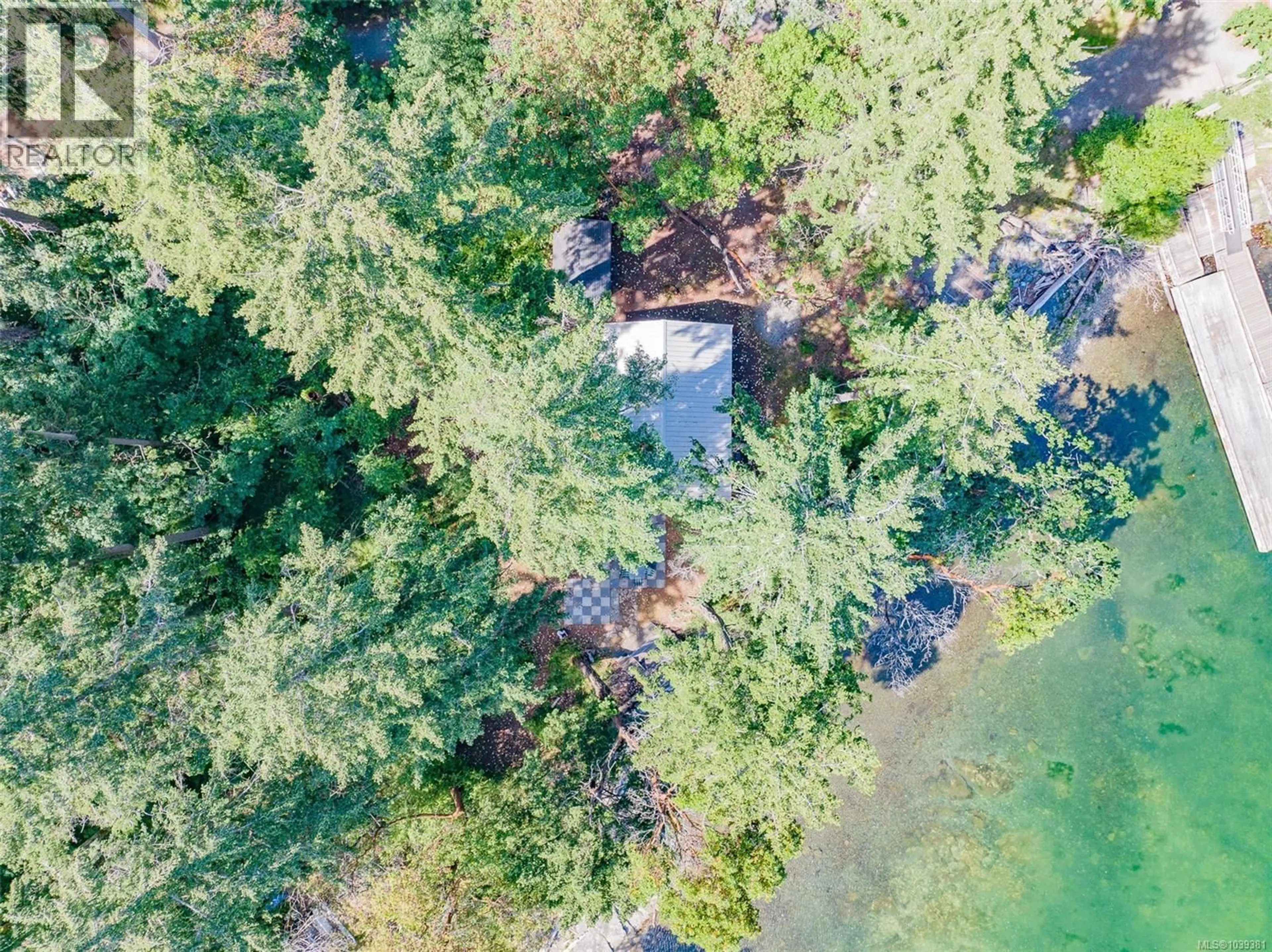 A pic from outside/outdoor area/front of a property/back of a property/a pic from drone, forest/trees view for 7 PIRATES LANE, Protection Island British Columbia V0R2H0