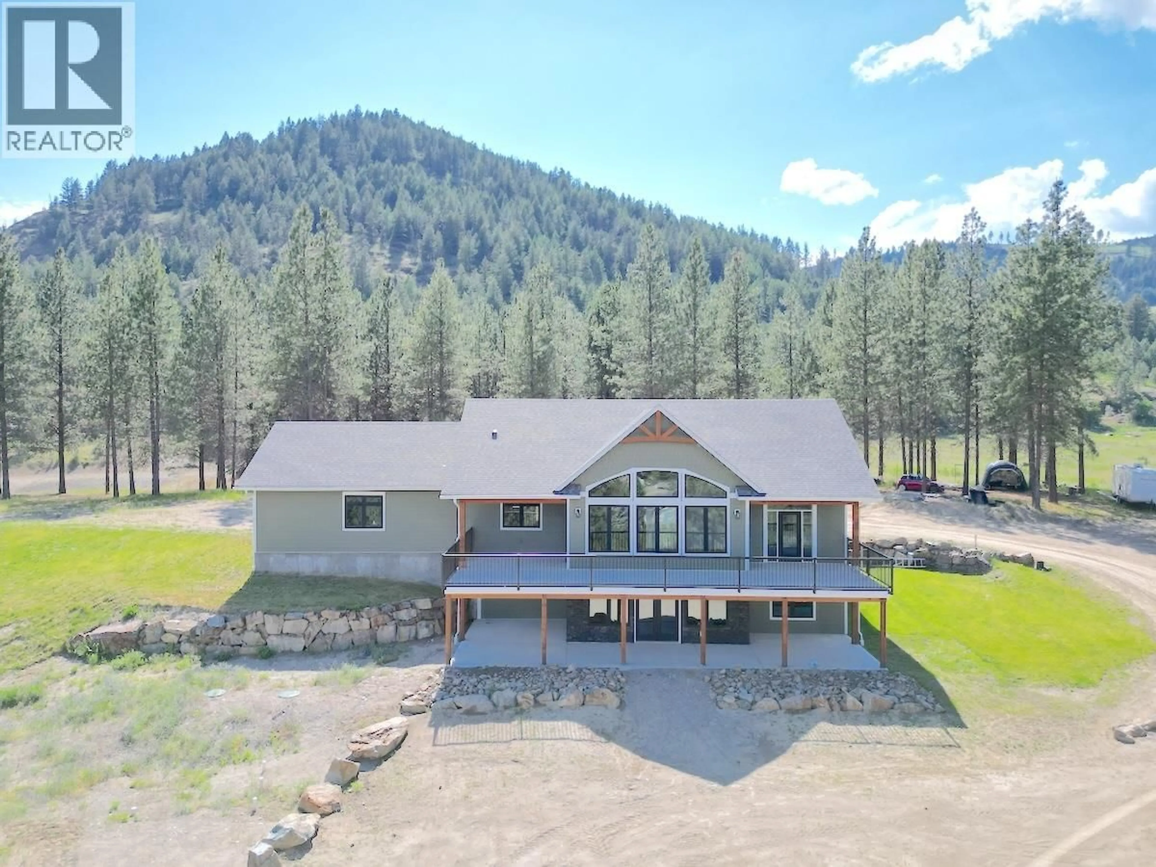 A pic from outside/outdoor area/front of a property/back of a property/a pic from drone, mountain view for 7735 GN ROAD, Grand Forks British Columbia V0H1H2