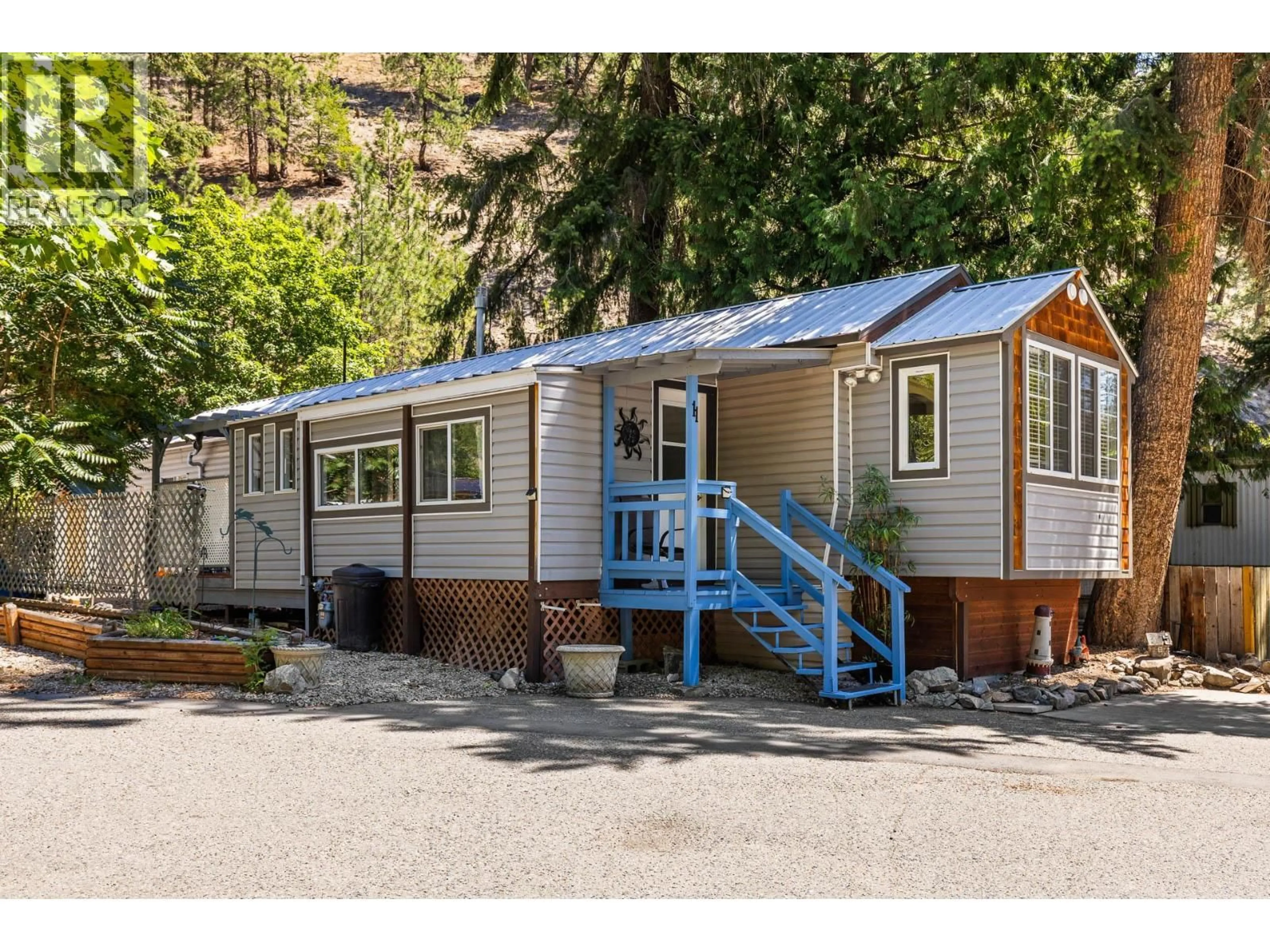 Home with vinyl exterior material, street for 11 - 5432 CHIDLEY ROAD, Peachland British Columbia V0H1X5