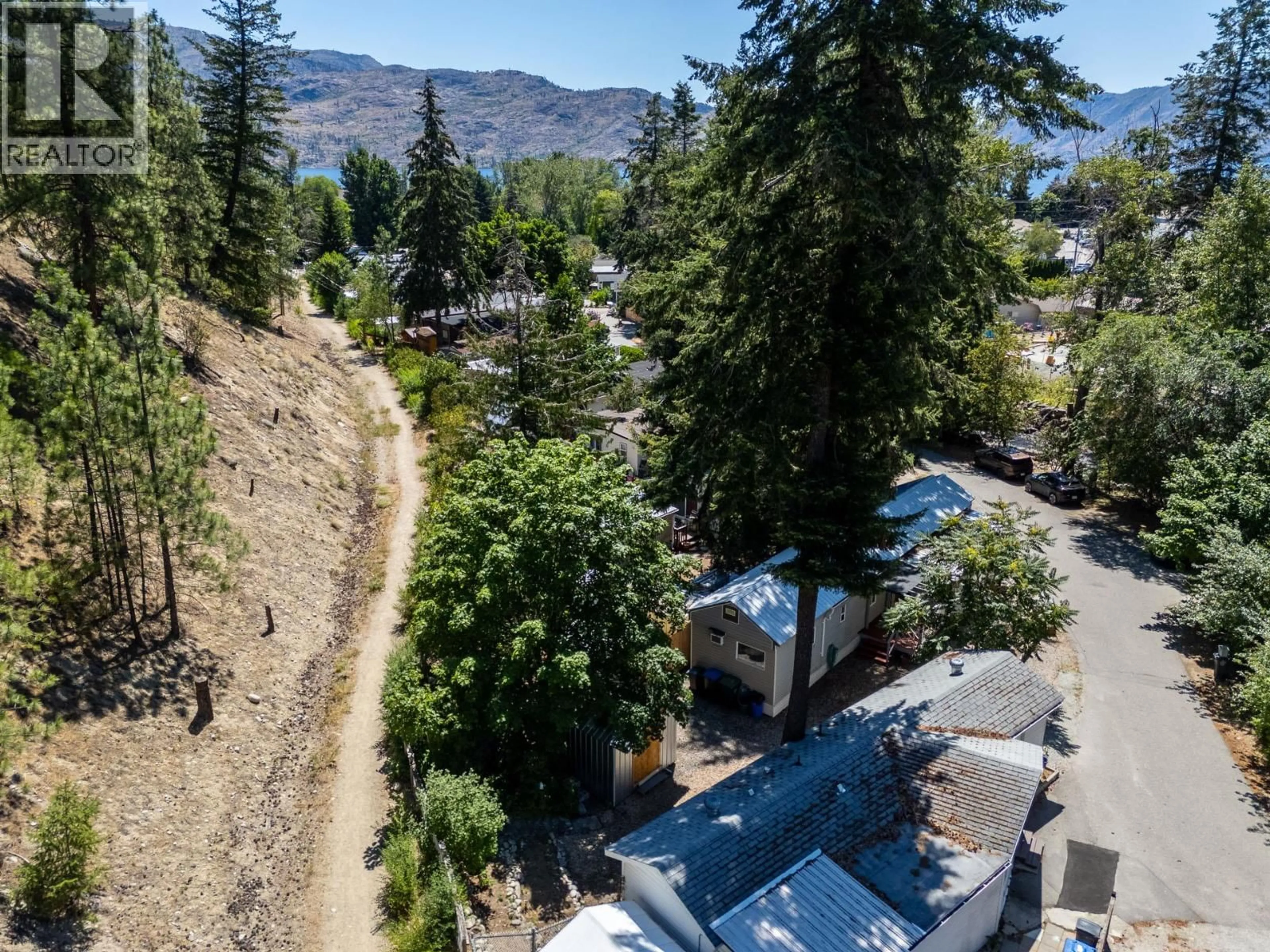 A pic from outside/outdoor area/front of a property/back of a property/a pic from drone, mountain view for 11 - 5432 CHIDLEY ROAD, Peachland British Columbia V0H1X5