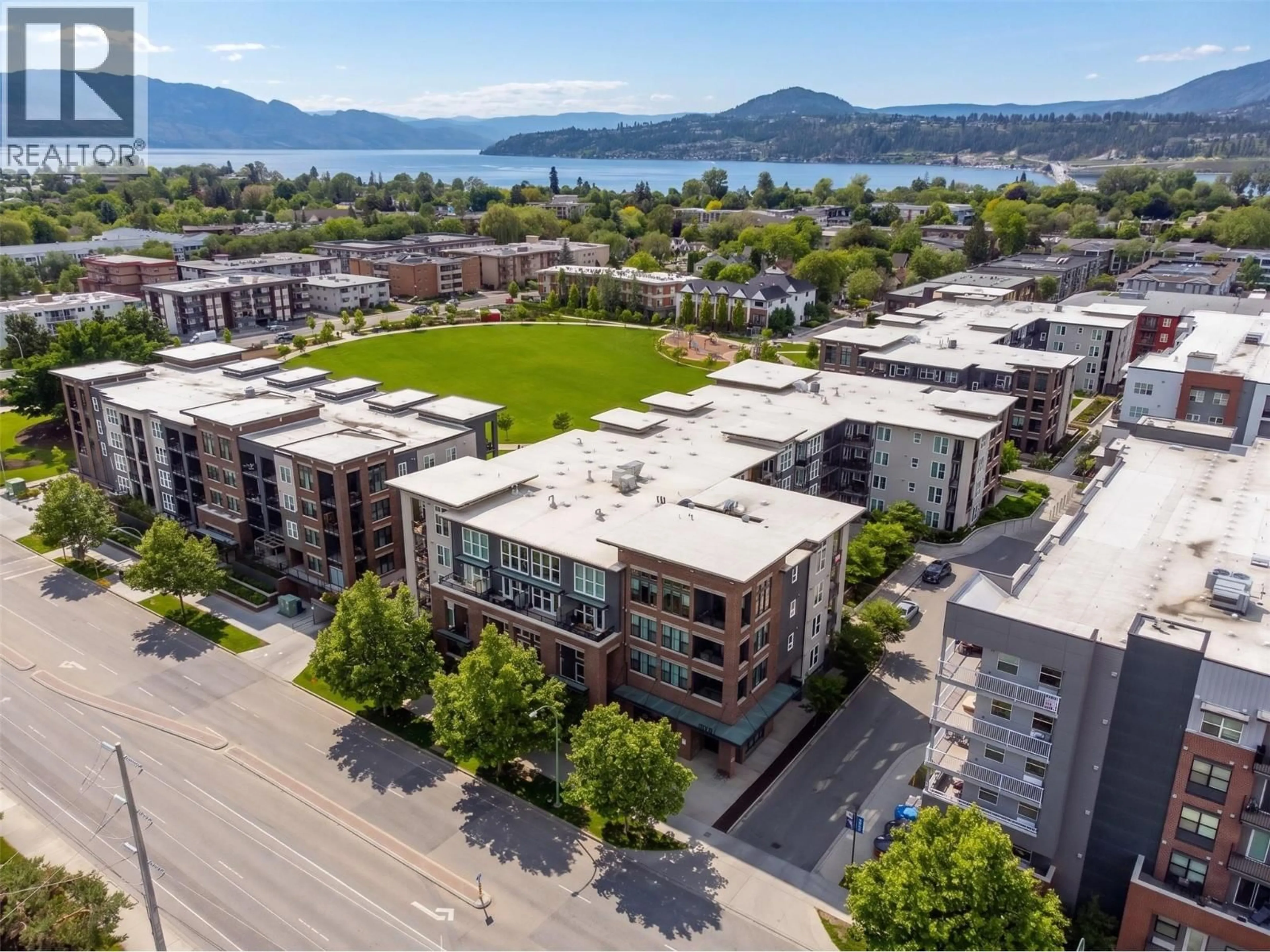 A pic from outside/outdoor area/front of a property/back of a property/a pic from drone, mountain view for PH7 - 1770 RICHTER STREET, Kelowna British Columbia V1Y0E6