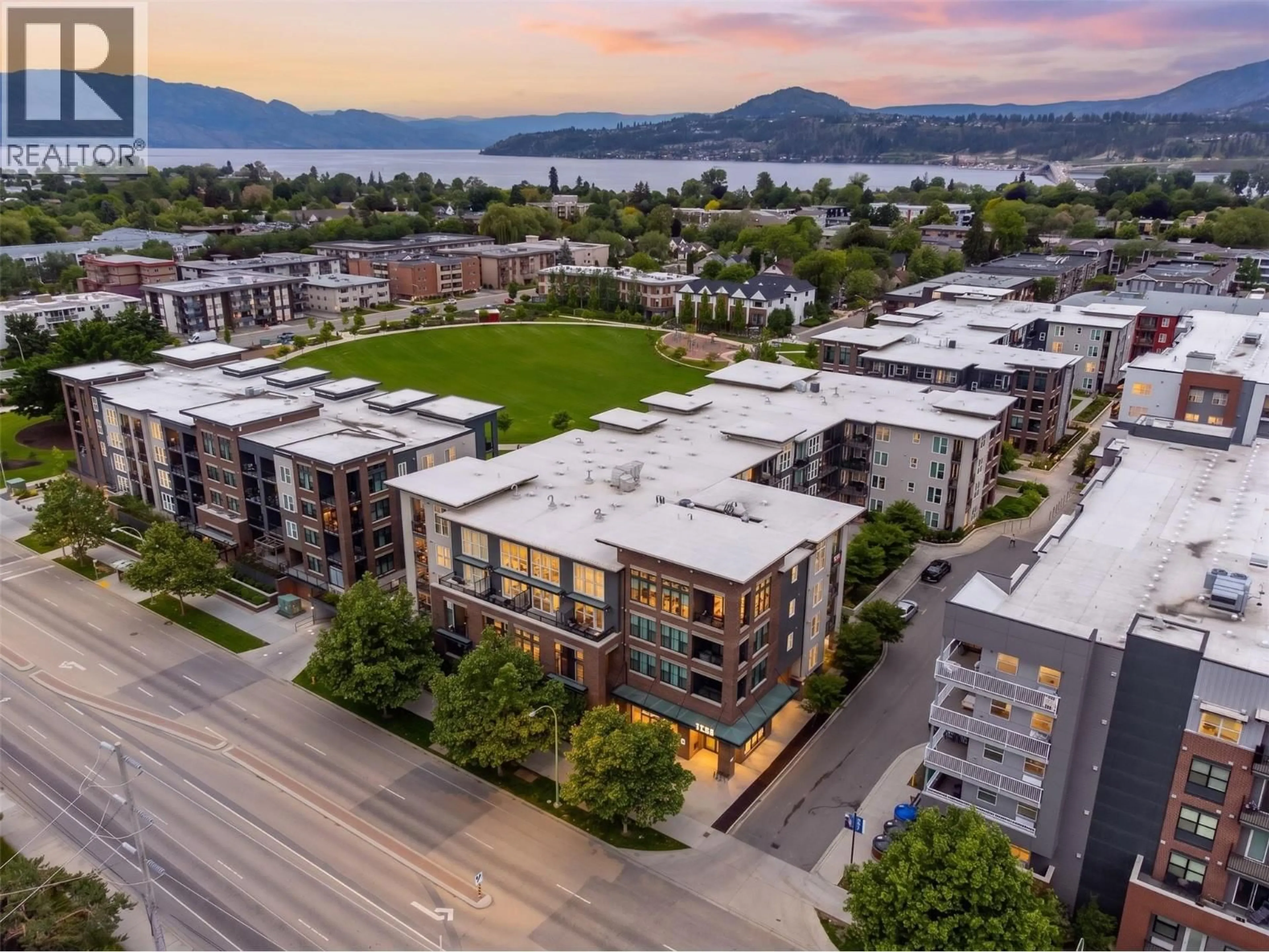 A pic from outside/outdoor area/front of a property/back of a property/a pic from drone, mountain view for PH7 - 1770 RICHTER STREET, Kelowna British Columbia V1Y0E6