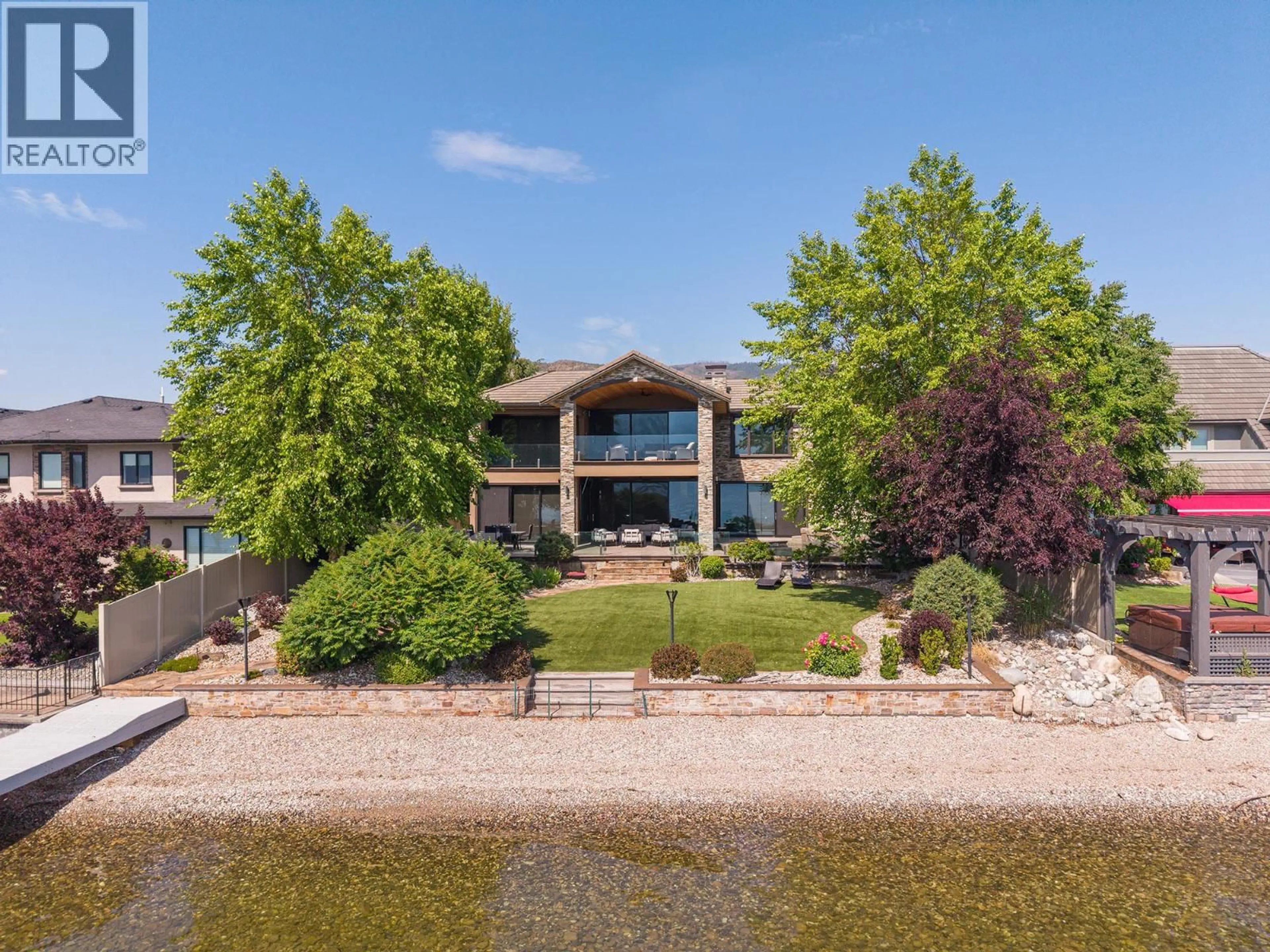 A pic from outside/outdoor area/front of a property/back of a property/a pic from drone, water/lake/river/ocean view for 4165 GELLATLY ROAD, West Kelowna British Columbia V4T2K2
