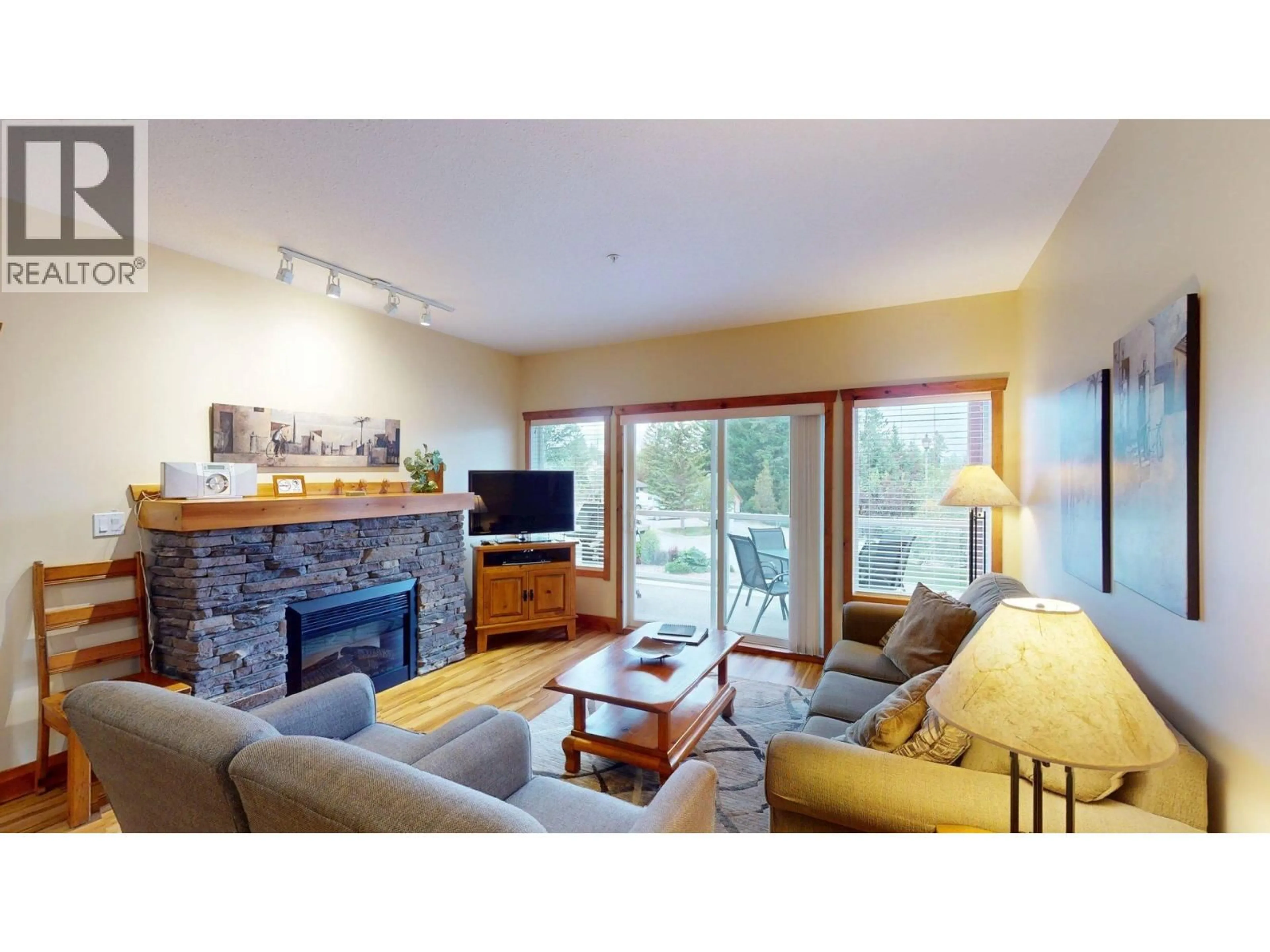 Living room with furniture, wood/laminate floor for 213 I - 701 14A CRESCENT, Invermere British Columbia V0A1K0