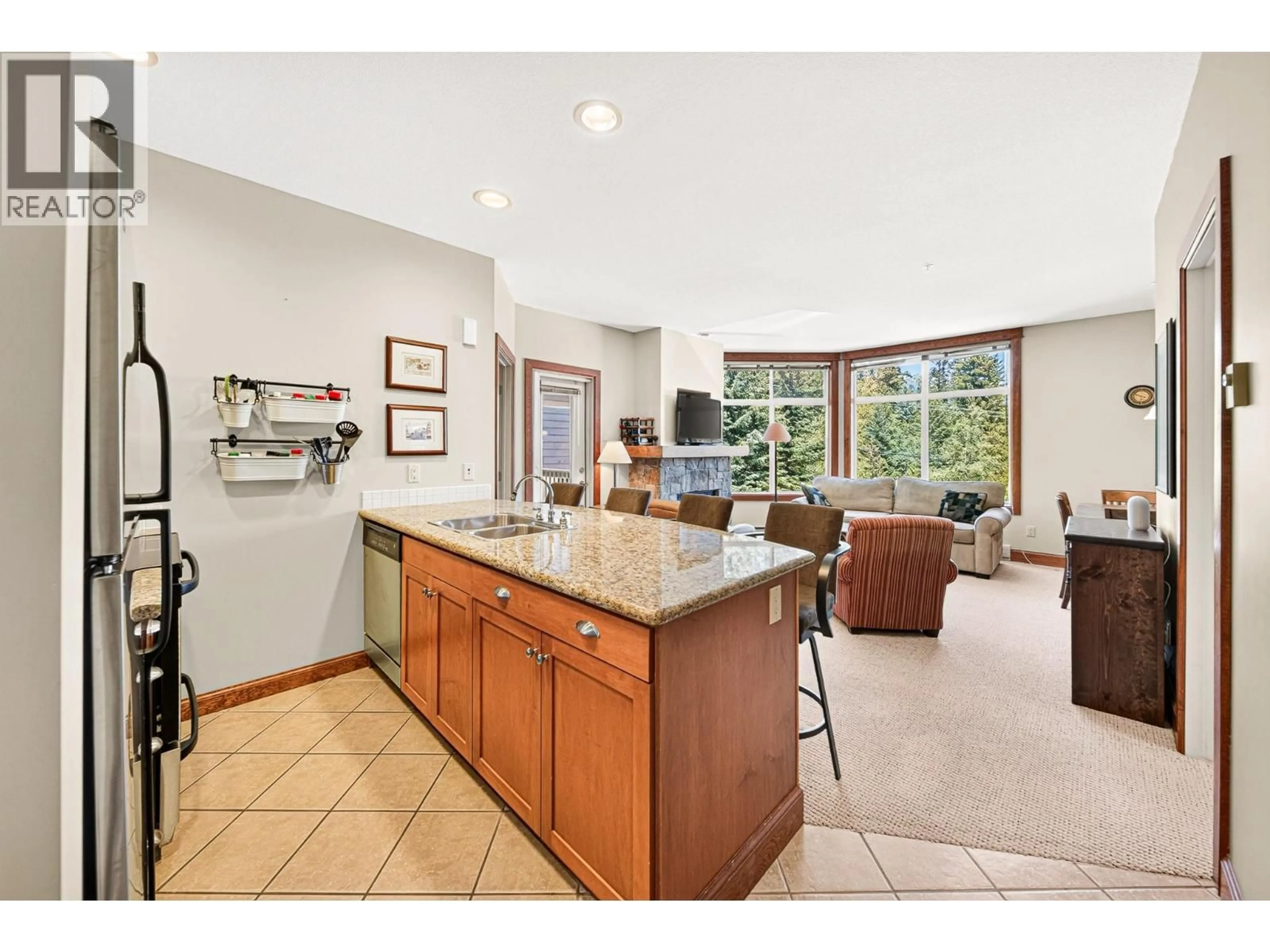 Open concept kitchen, ceramic/tile floor for 520 - 4559 TIMBERLINE CRESCENT, Fernie British Columbia V0B1M6