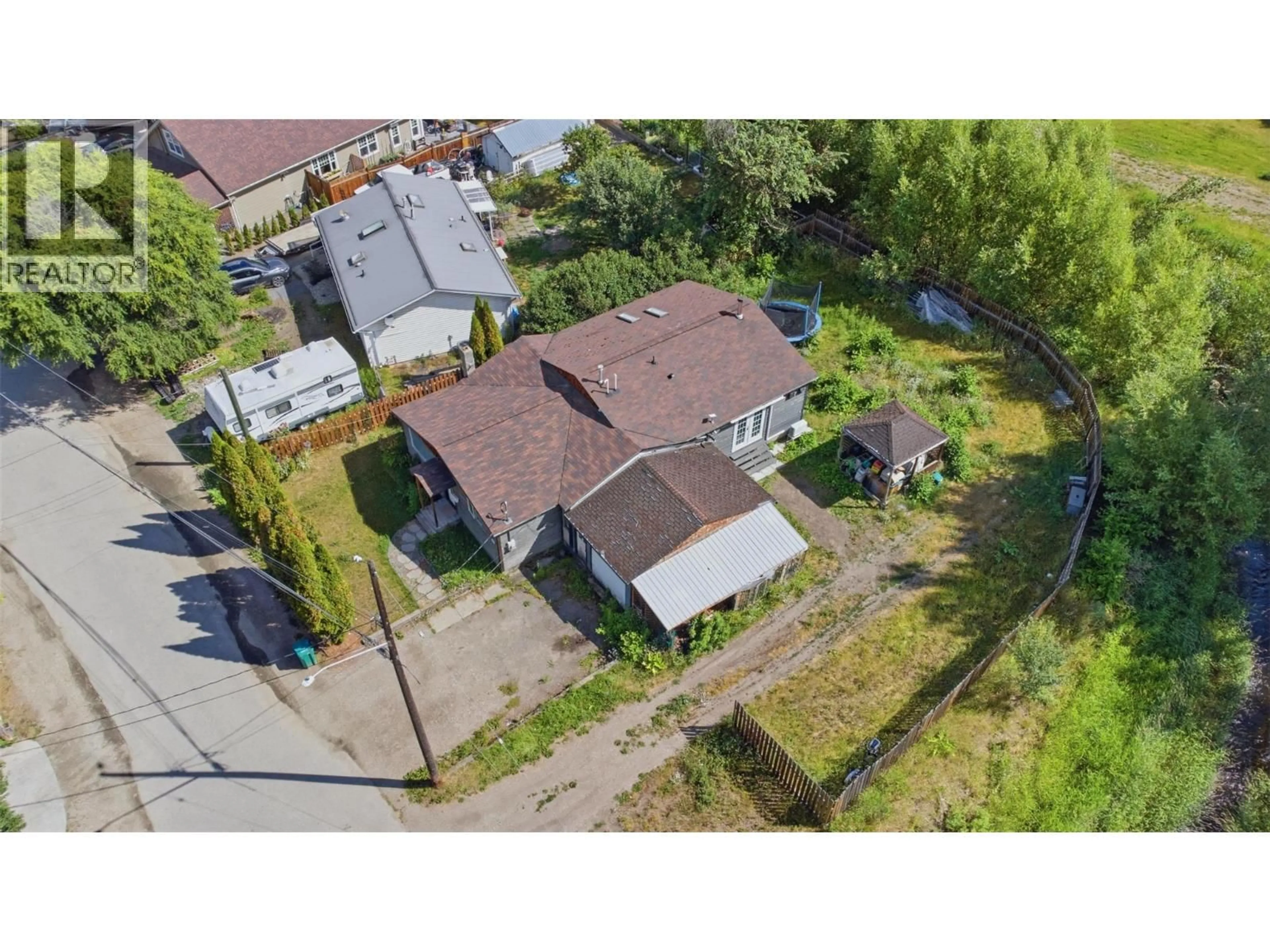 A pic from outside/outdoor area/front of a property/back of a property/a pic from drone, street for 2007 HEIGHWAY CRESCENT, Lumby British Columbia V0E2G0