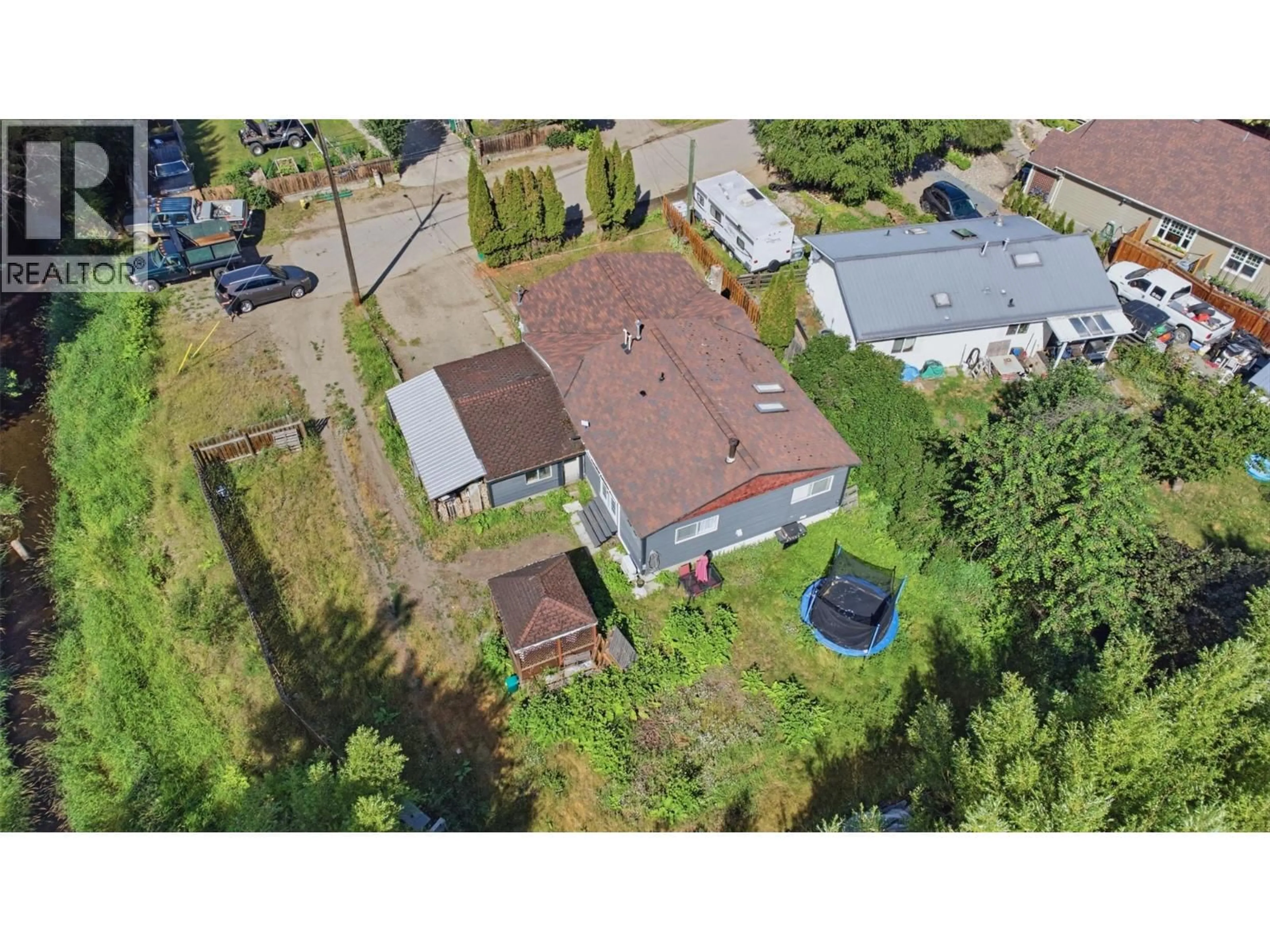 A pic from outside/outdoor area/front of a property/back of a property/a pic from drone, street for 2007 HEIGHWAY CRESCENT, Lumby British Columbia V0E2G0