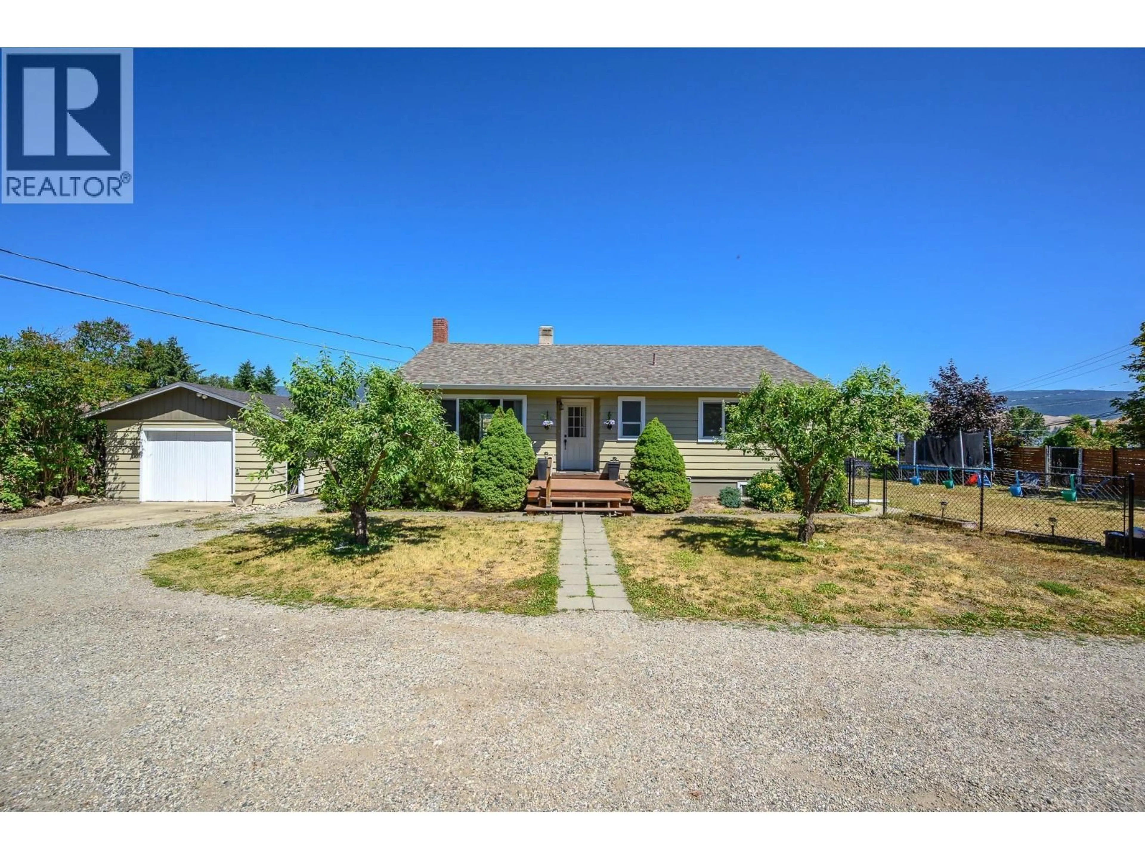 A pic from outside/outdoor area/front of a property/back of a property/a pic from drone, street for 2570 ROBINSON ROAD, Lake Country British Columbia V4V1G4