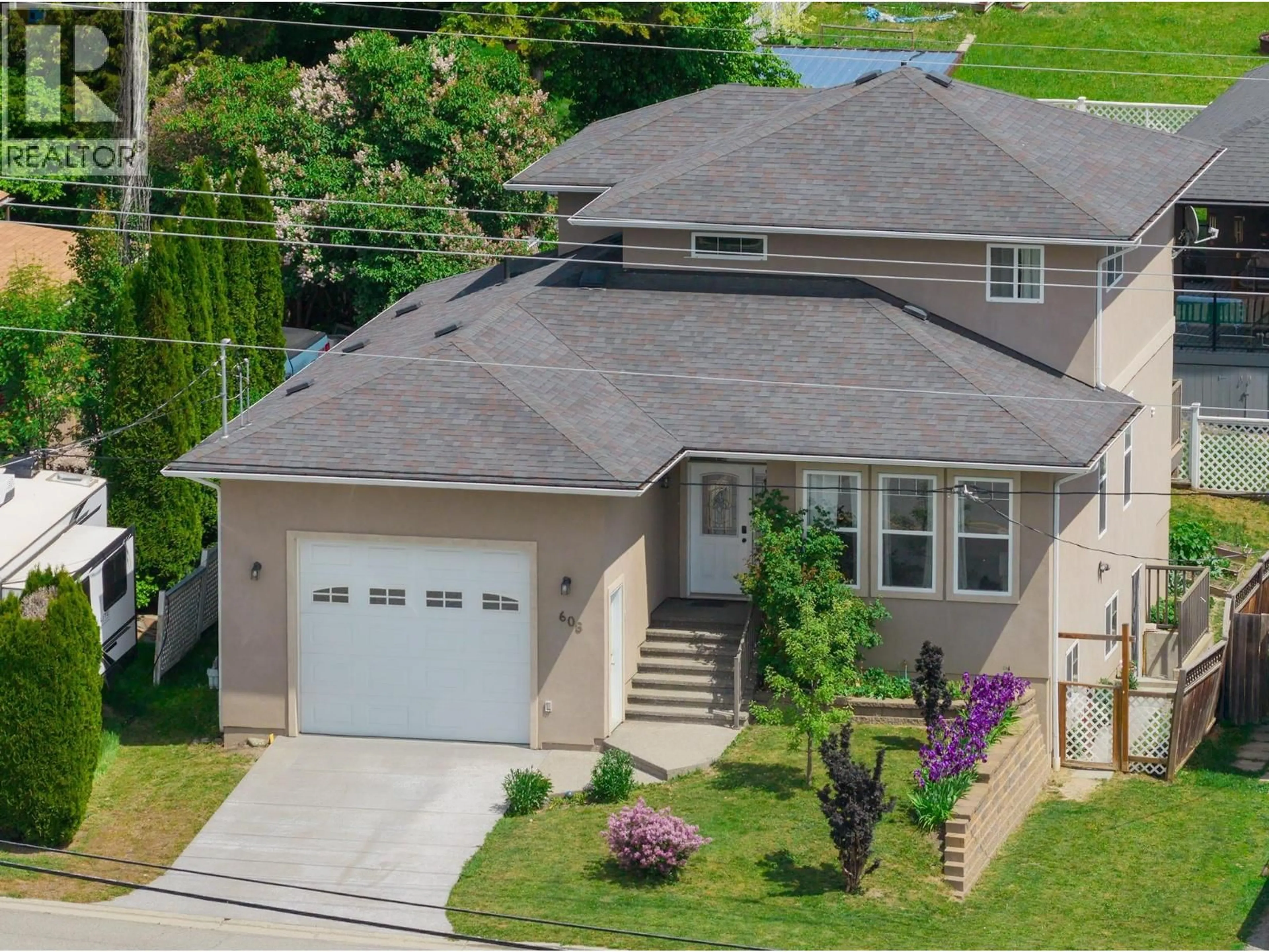A pic from outside/outdoor area/front of a property/back of a property/a pic from drone, street for 608 16TH  N AVENUE, Creston British Columbia V0B1G5