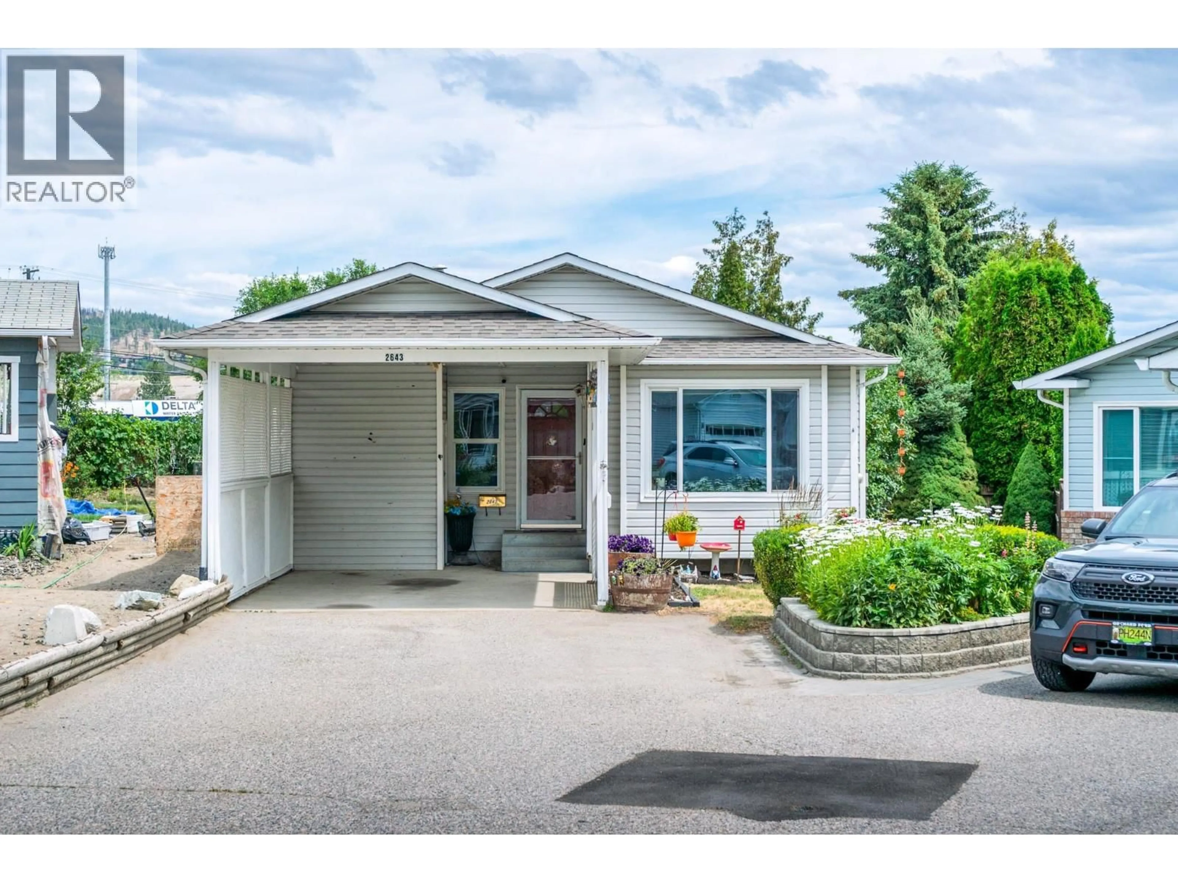 Home with vinyl exterior material, street for 2643 APPLEGREEN COURT, West Kelowna British Columbia V1Z3K8