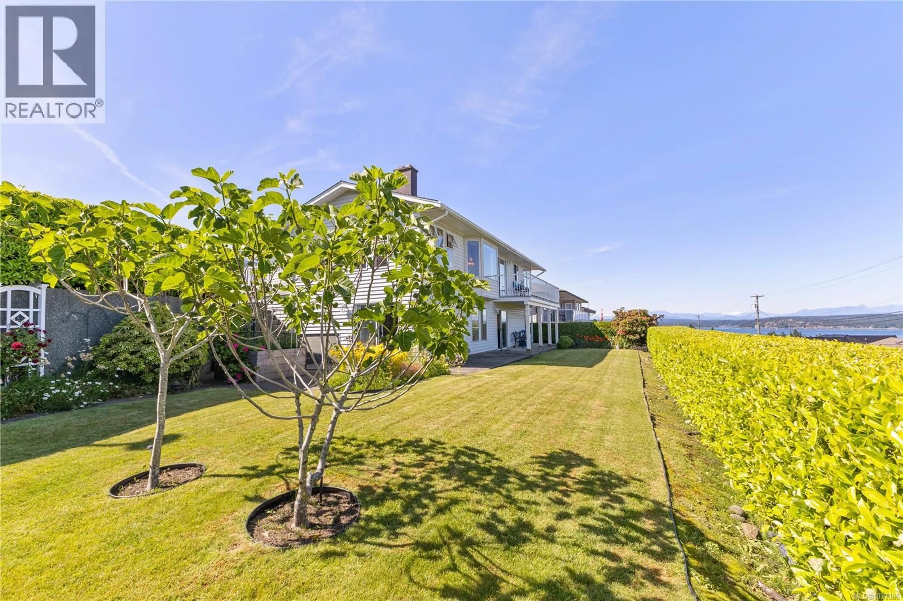 A pic from outside/outdoor area/front of a property/back of a property/a pic from drone, water/lake/river/ocean view for 537 PONDEROSA PLACE, Campbell River British Columbia V9W6Z2