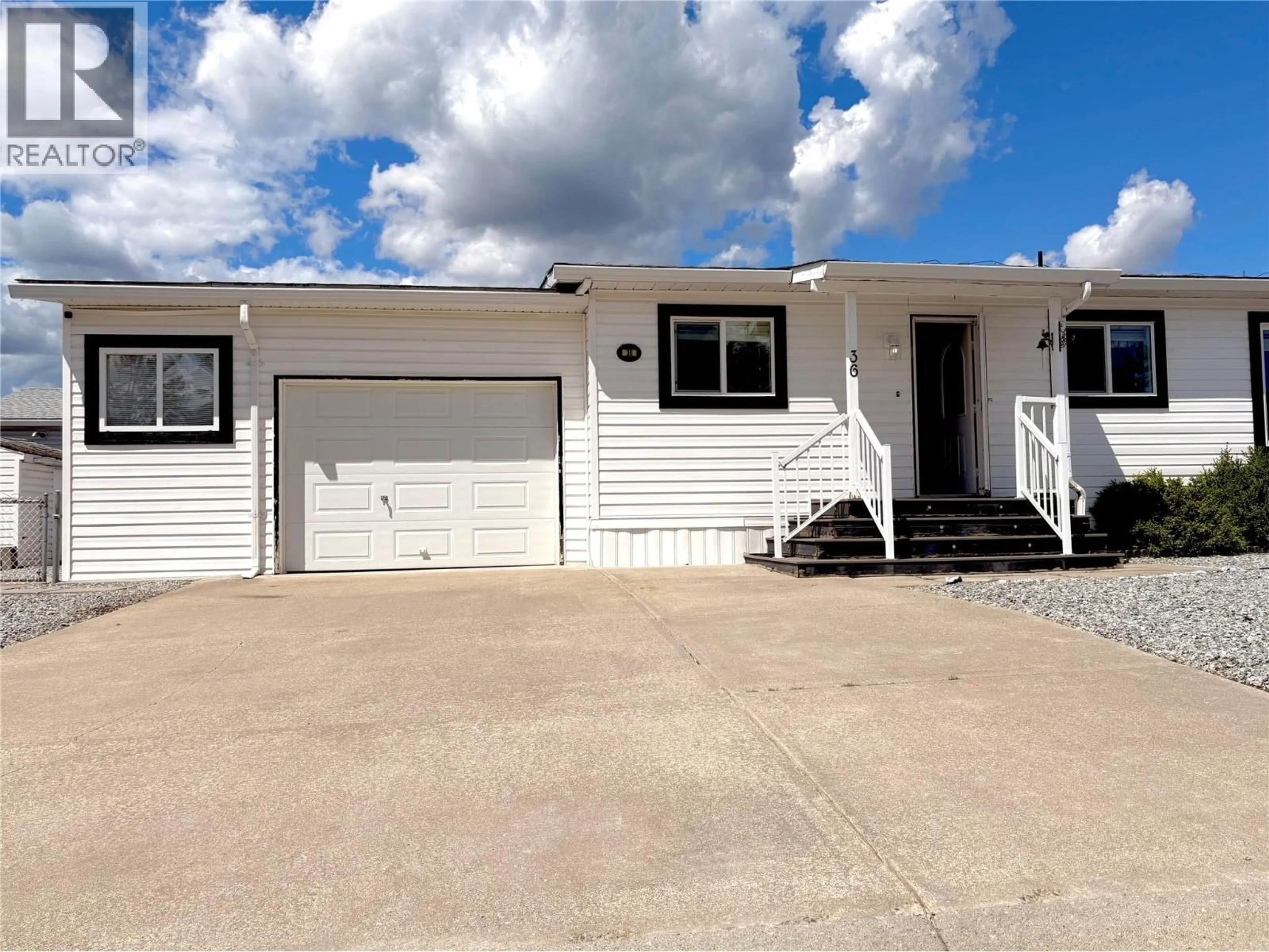 Home with vinyl exterior material, street for 36 - 9510 97 HIGHWAY NORTH, Vernon British Columbia V1H1R8
