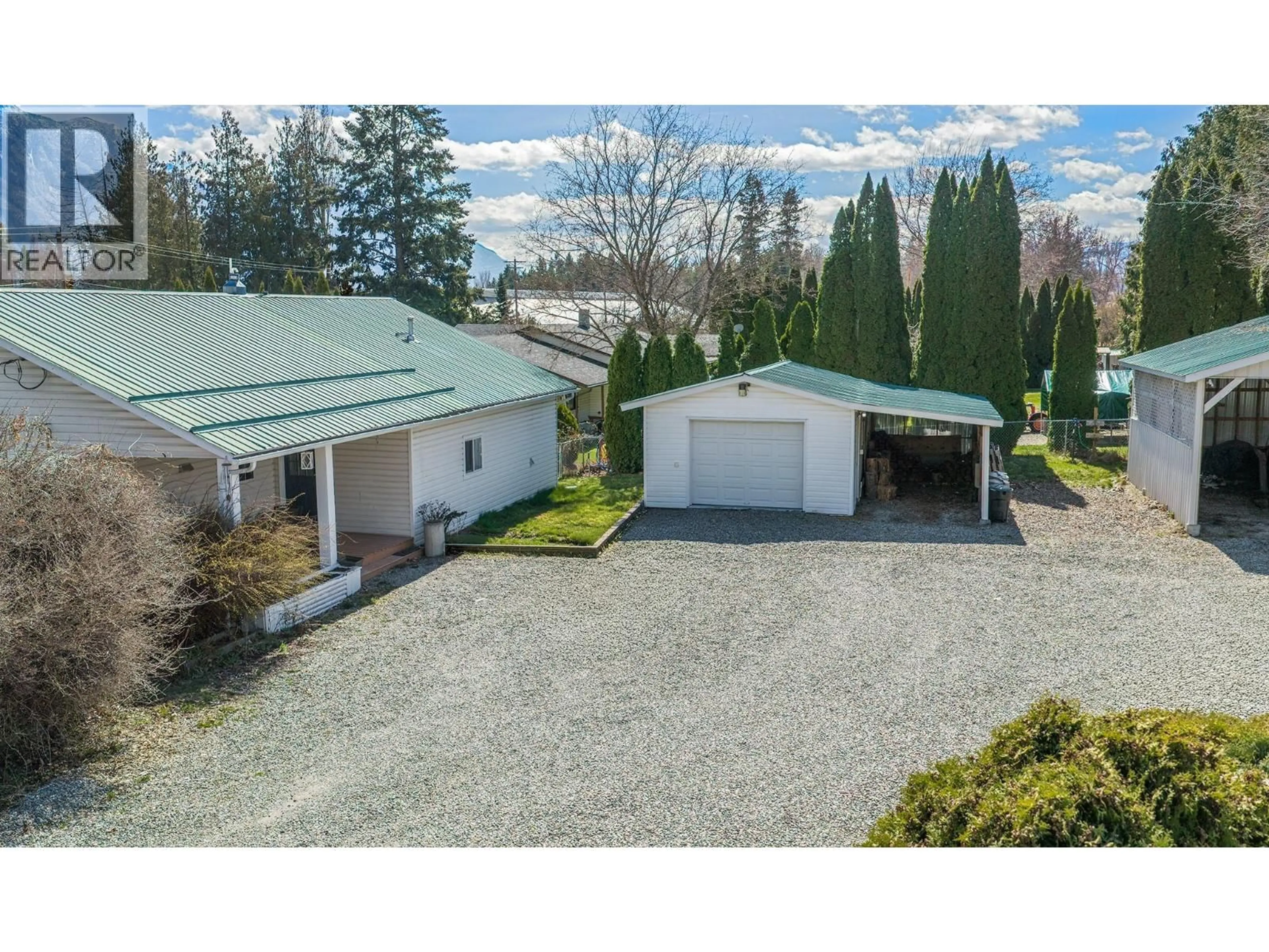 A pic from outside/outdoor area/front of a property/back of a property/a pic from drone, unknown for 3433 ERICKSON ROAD, Creston British Columbia V0B1G1