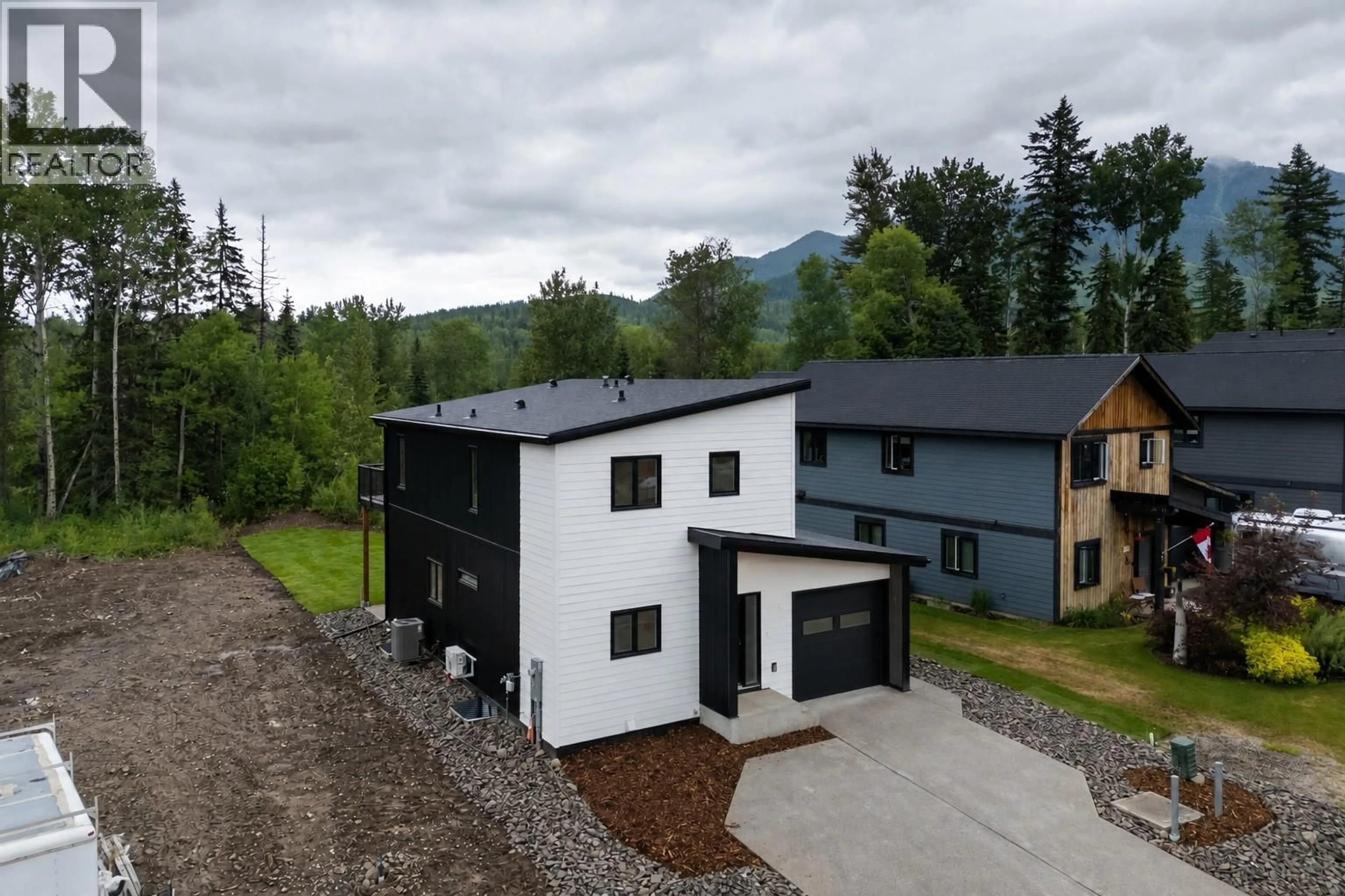 A pic from outside/outdoor area/front of a property/back of a property/a pic from drone, mountain view for 113 WHITETAIL DRIVE, Fernie British Columbia V0B1M4