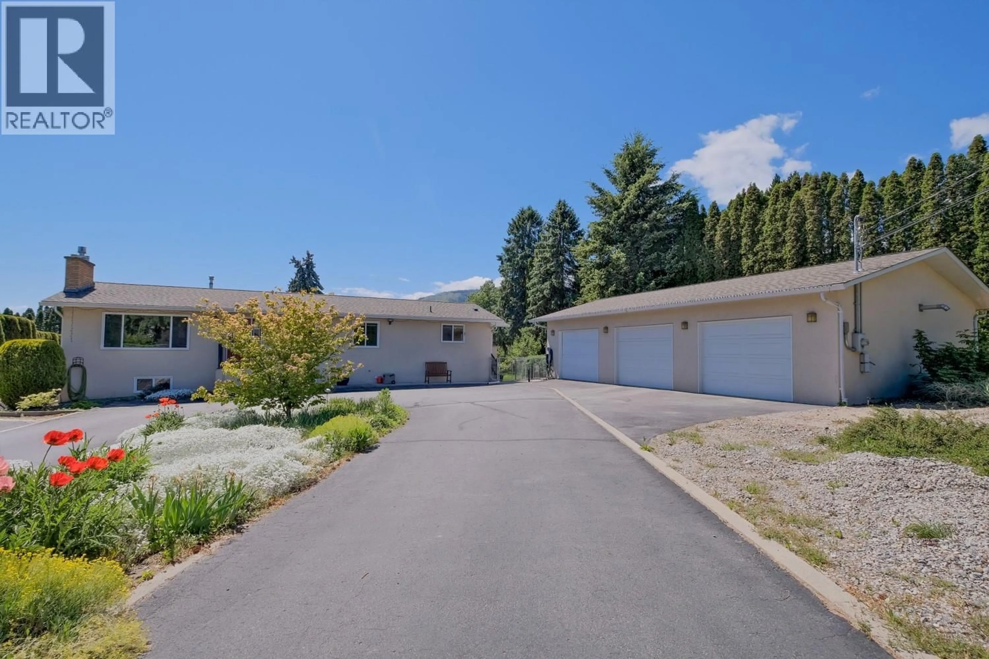 A pic from outside/outdoor area/front of a property/back of a property/a pic from drone, street for 709 BARTLETT DRIVE, Penticton British Columbia V2A7K8