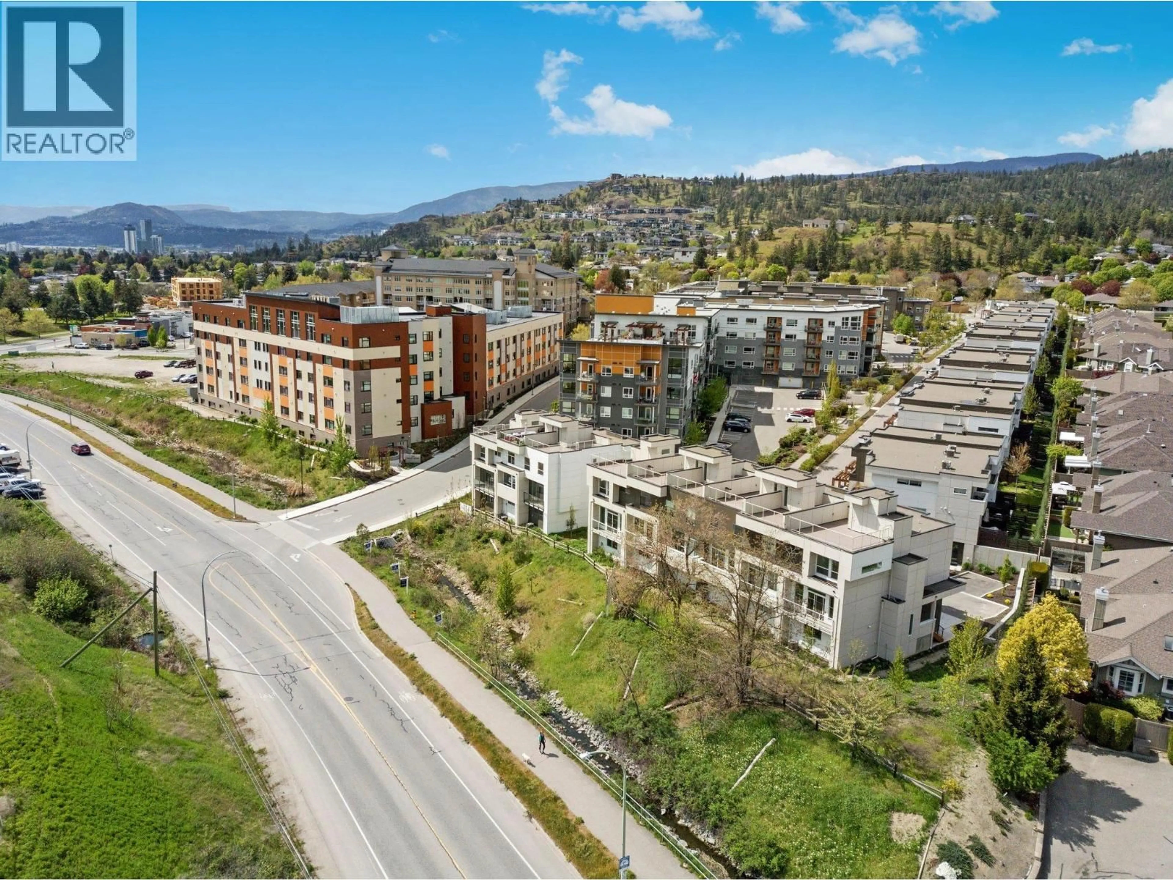 A pic from outside/outdoor area/front of a property/back of a property/a pic from drone, mountain view for 44 - 720 VALLEY ROAD, Kelowna British Columbia V1V0E1