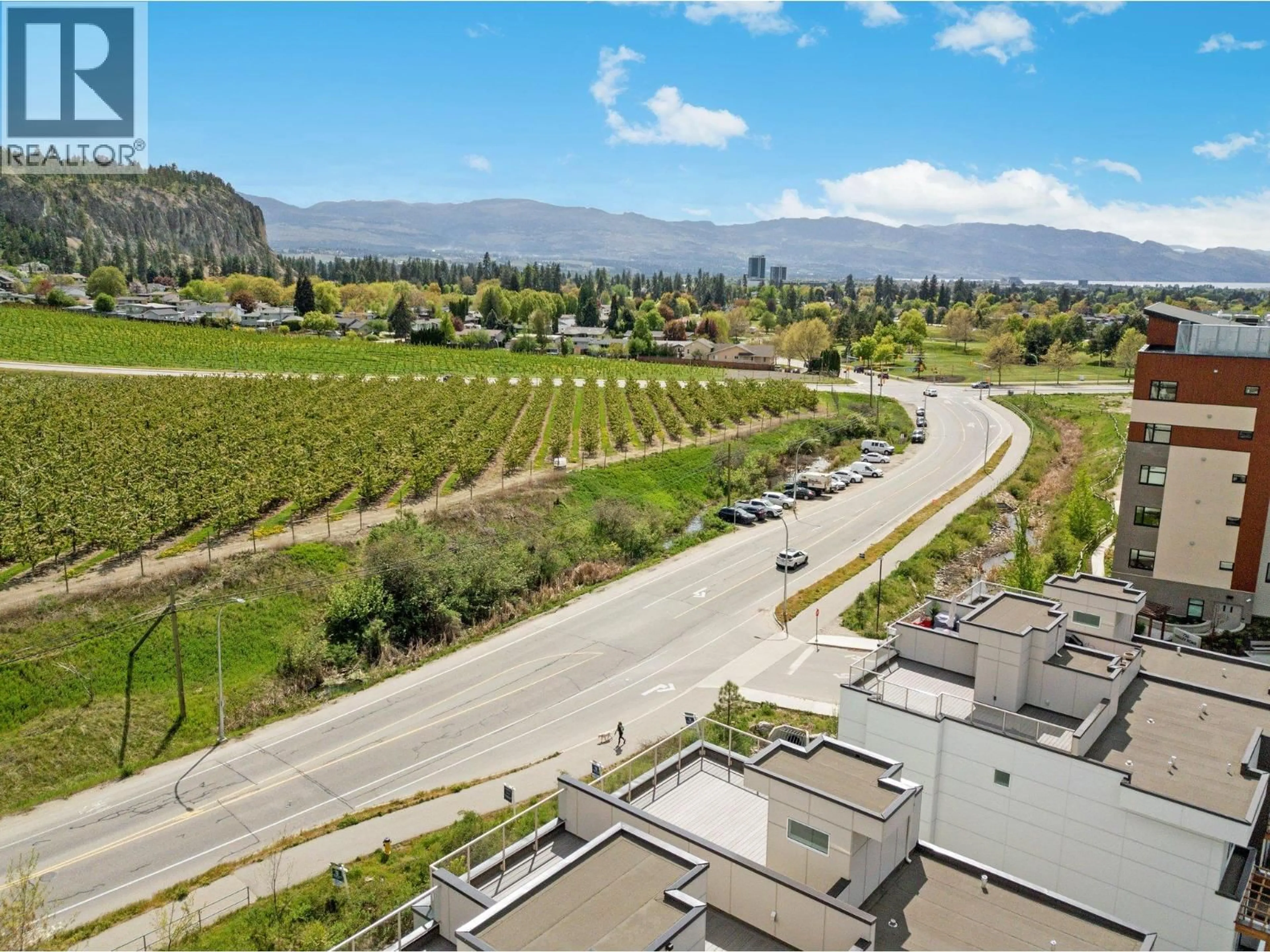 A pic from outside/outdoor area/front of a property/back of a property/a pic from drone, mountain view for 44 - 720 VALLEY ROAD, Kelowna British Columbia V1V0E1