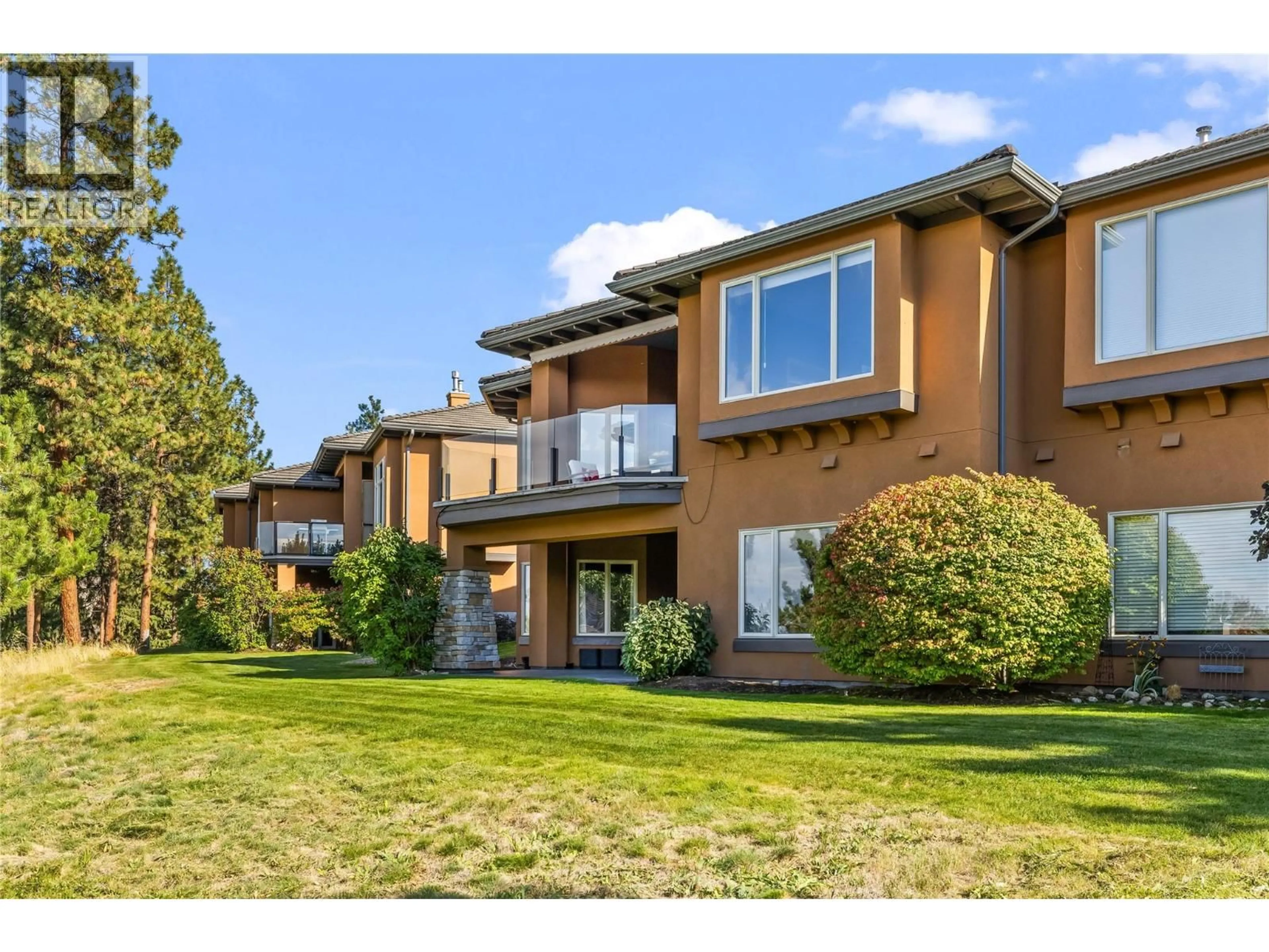 A pic from outside/outdoor area/front of a property/back of a property/a pic from drone, unknown for 2 - 4100 GALLAGHERS PARKLAND, Kelowna British Columbia V1W3Z8