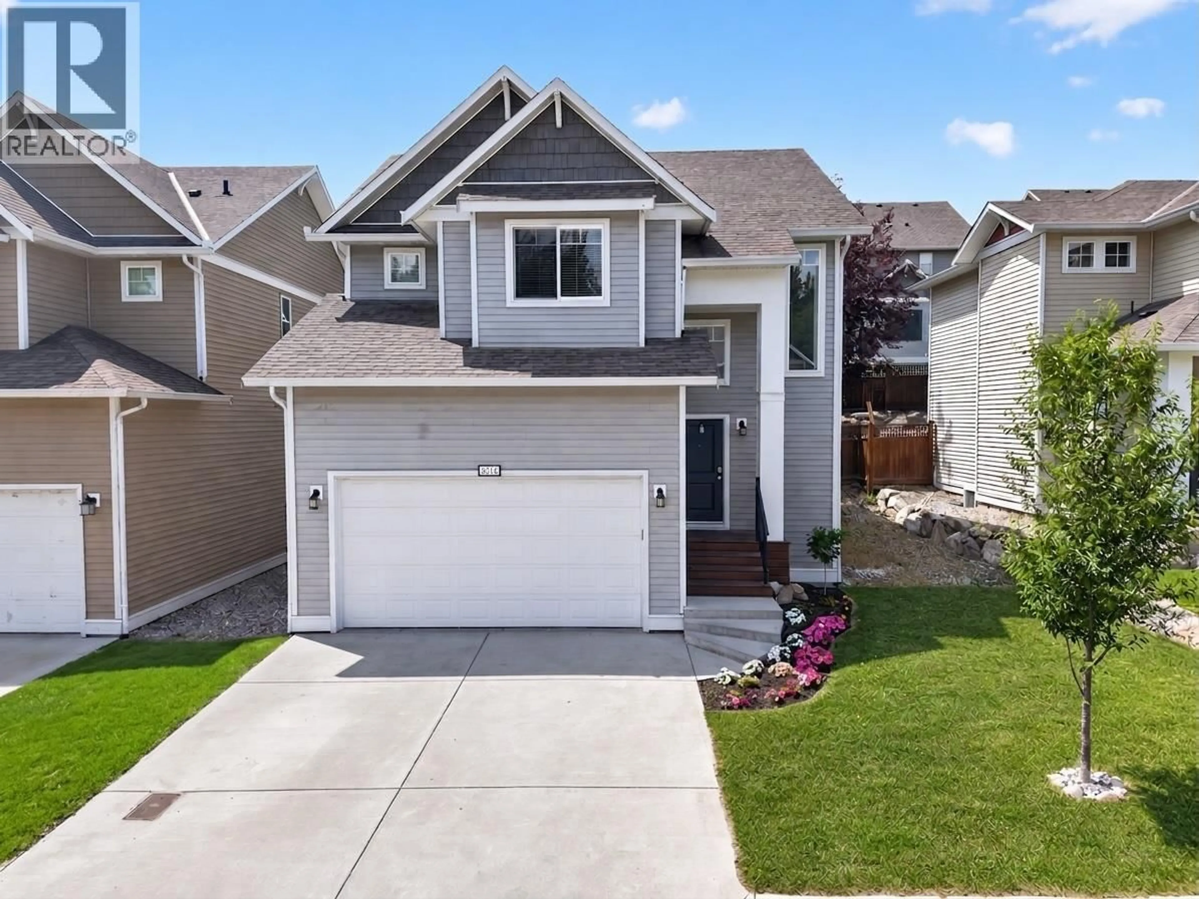 Home with vinyl exterior material, street for 2014 ELKRIDGE DRIVE, West Kelowna British Columbia V4T3J8