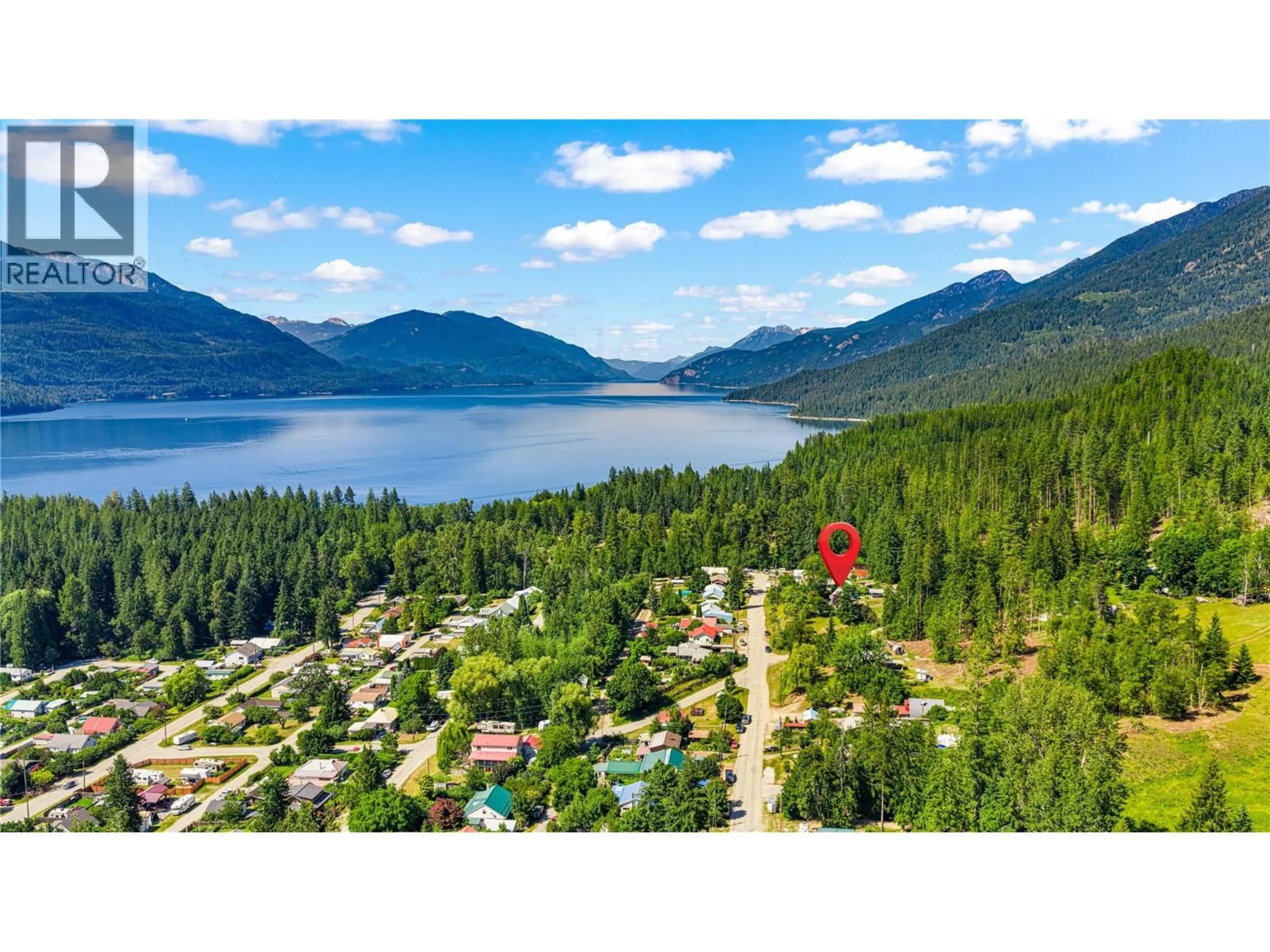A pic from outside/outdoor area/front of a property/back of a property/a pic from drone, water/lake/river/ocean view for 1618 RUSSEL AVENUE, Riondel British Columbia V0B2B0