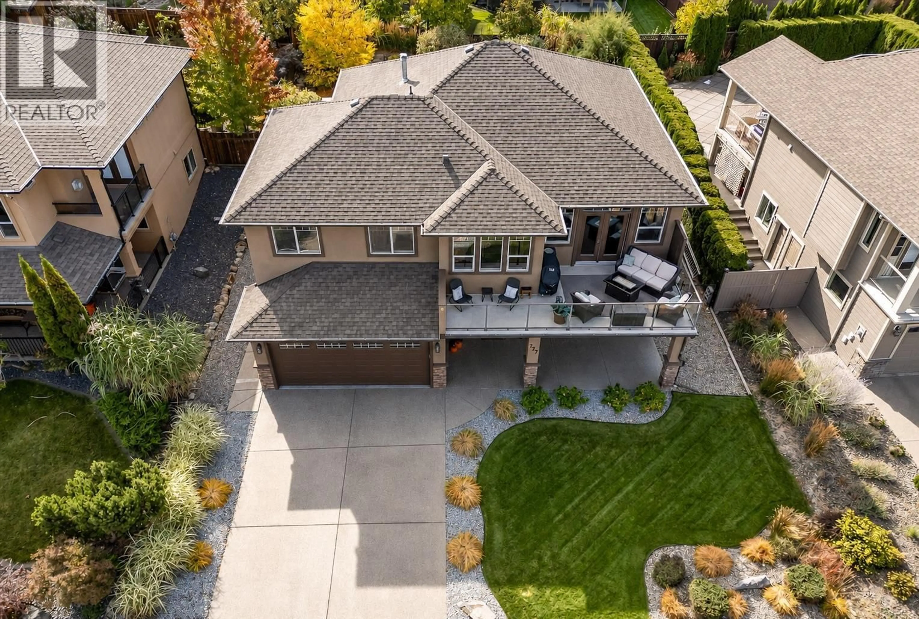 A pic from outside/outdoor area/front of a property/back of a property/a pic from drone, street for 737 KUIPERS CRESCENT, Kelowna British Columbia V1W5H4