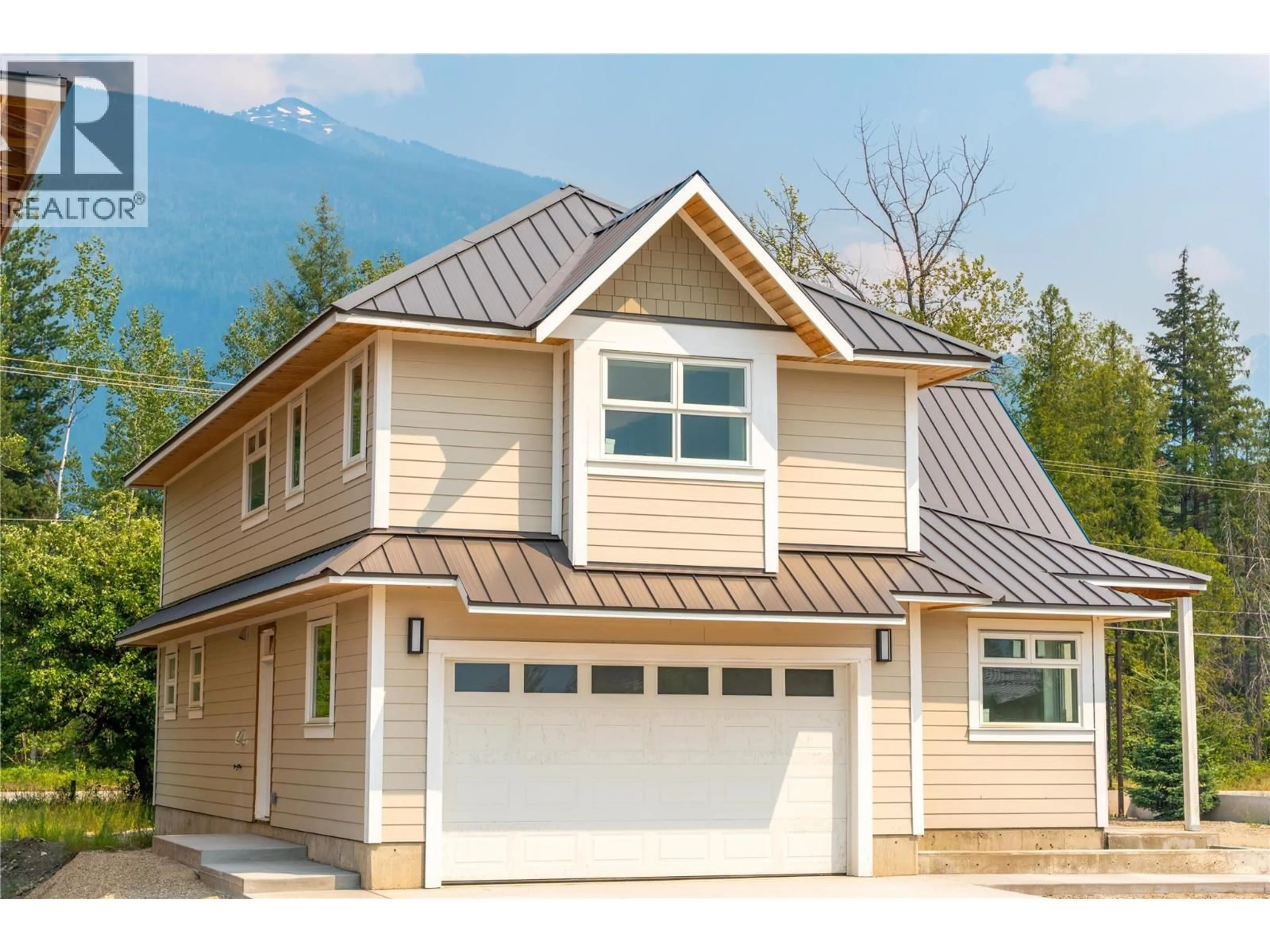Home with vinyl exterior material, street for 2014 LANZO LANE, Revelstoke British Columbia V0E2S1