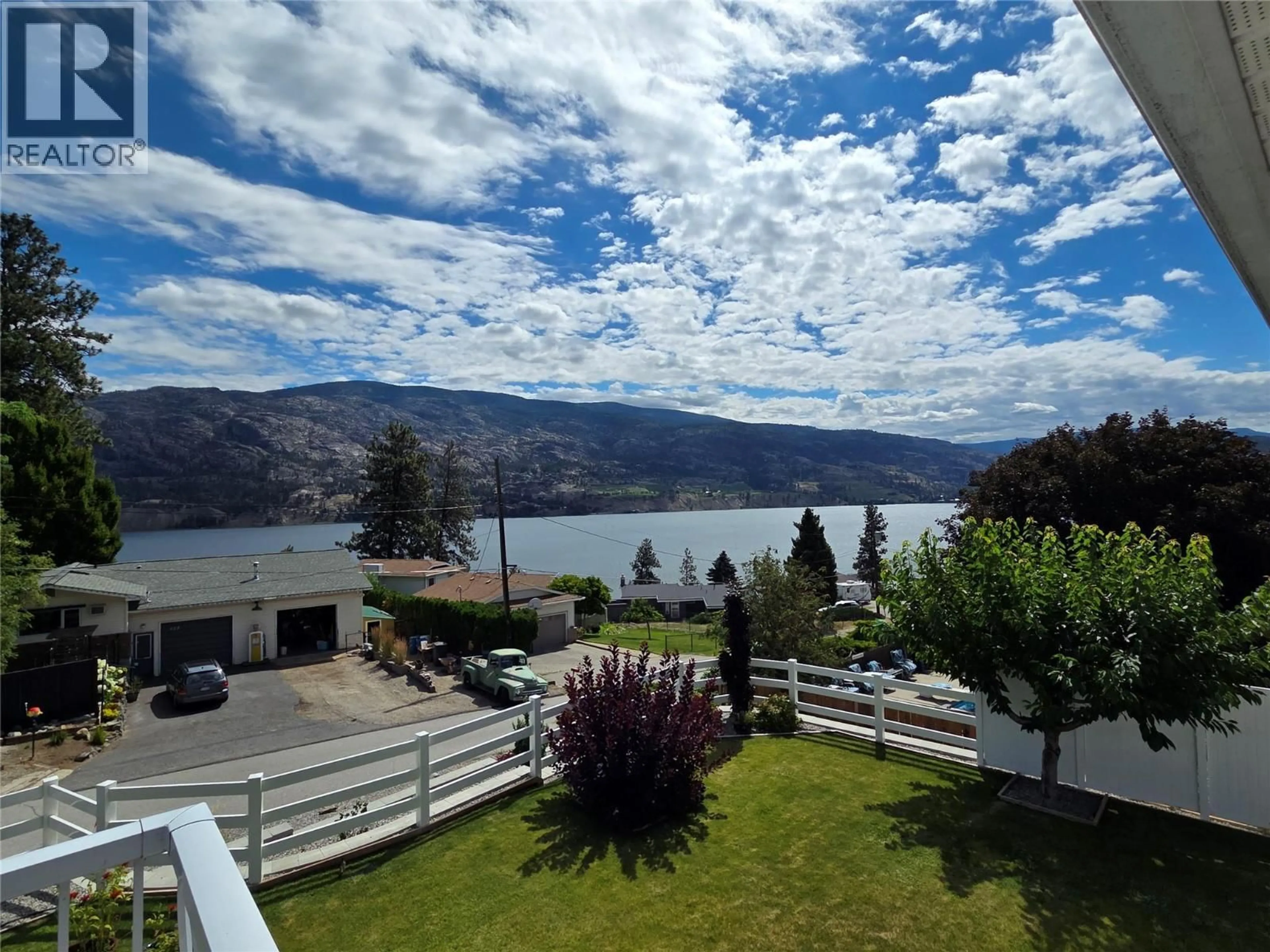 A pic from outside/outdoor area/front of a property/back of a property/a pic from drone, water/lake/river/ocean view for 114 CEDAR AVENUE, Kaleden British Columbia V0H1K0