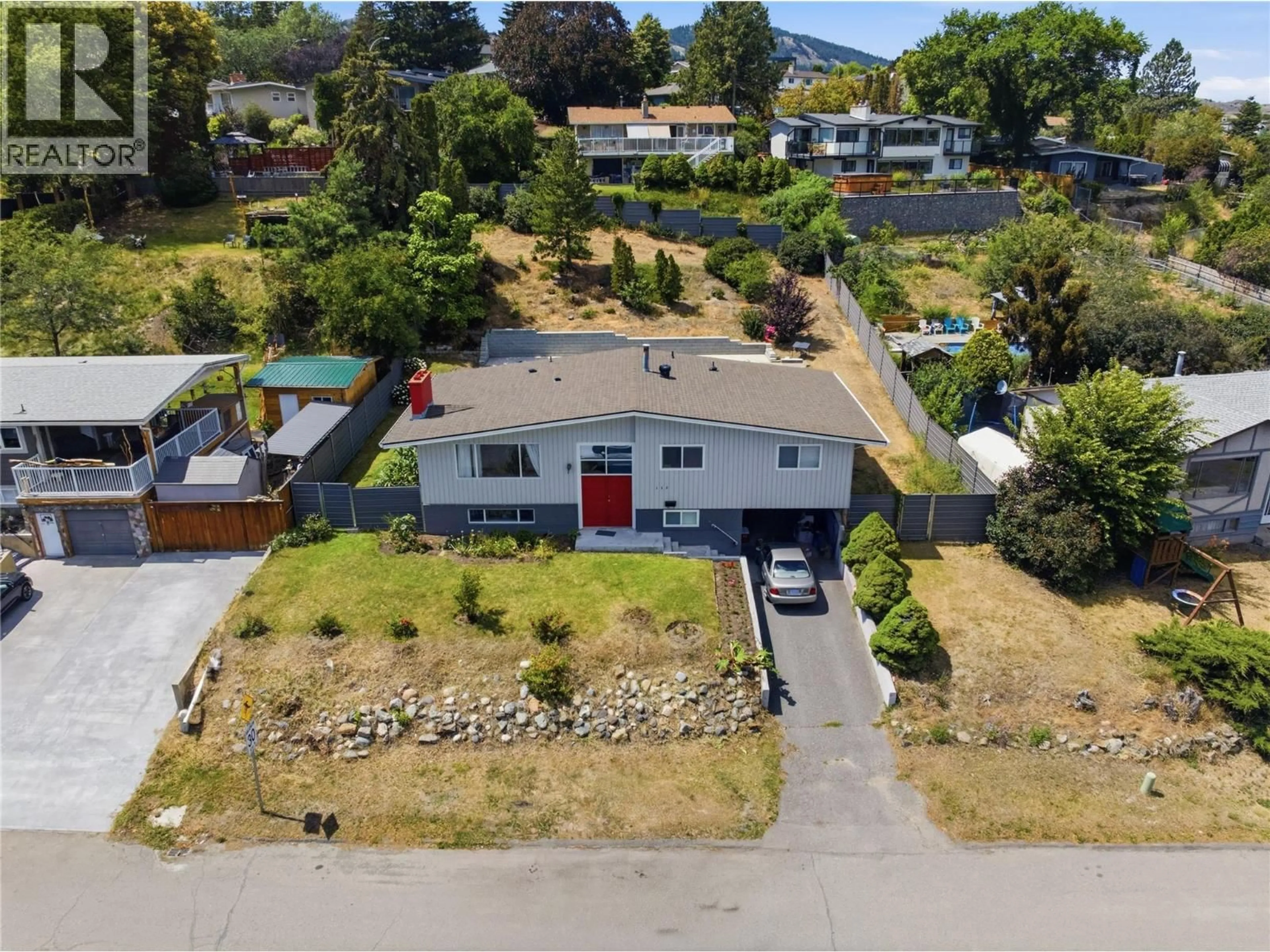 A pic from outside/outdoor area/front of a property/back of a property/a pic from drone, street for 355 PEMBERTON TERRACE, Kamloops British Columbia V2C1T2