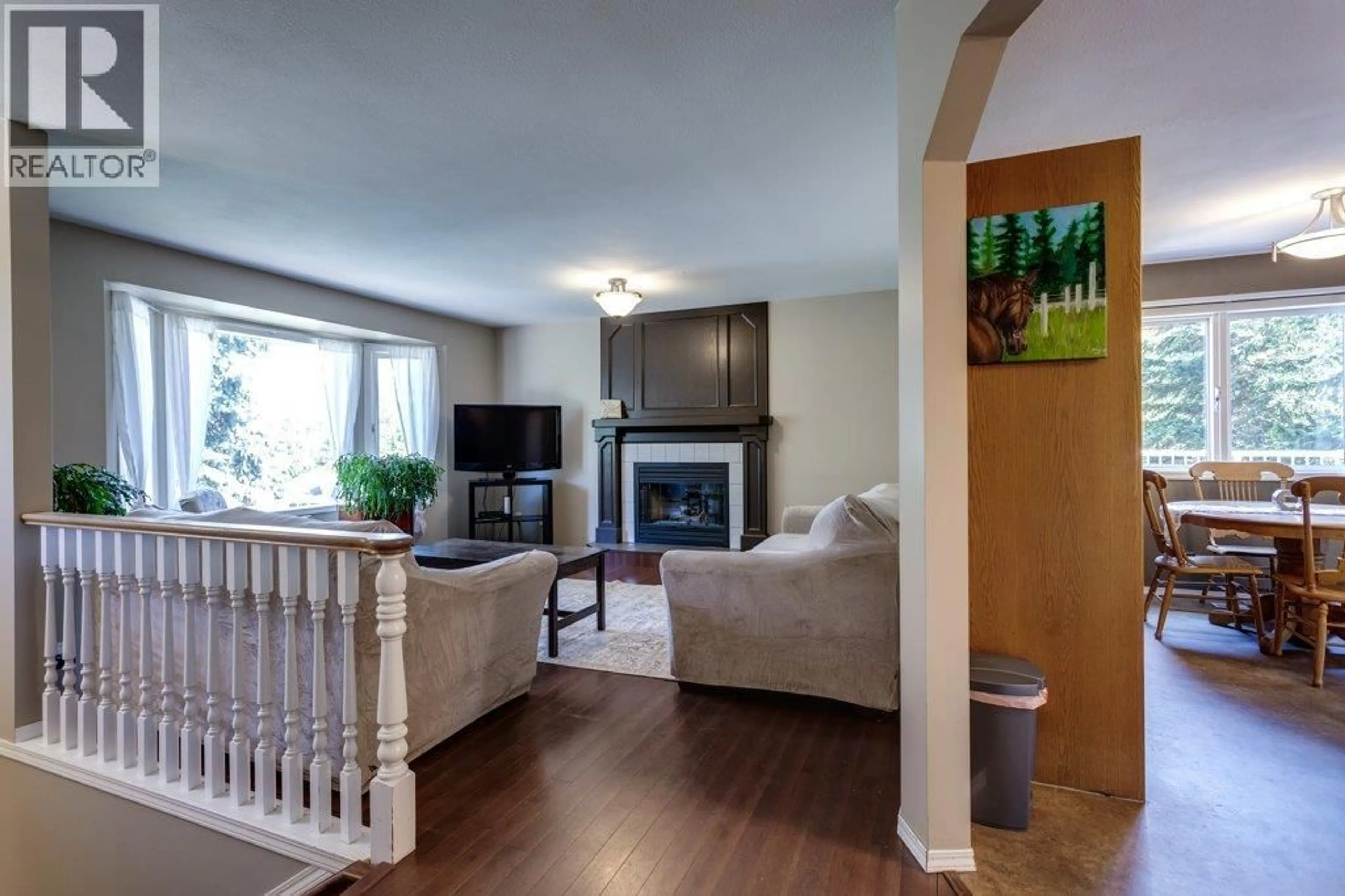 Living room with furniture, wood/laminate floor for 3542 ASHLEY COURT, West Kelowna British Columbia V4T1C3