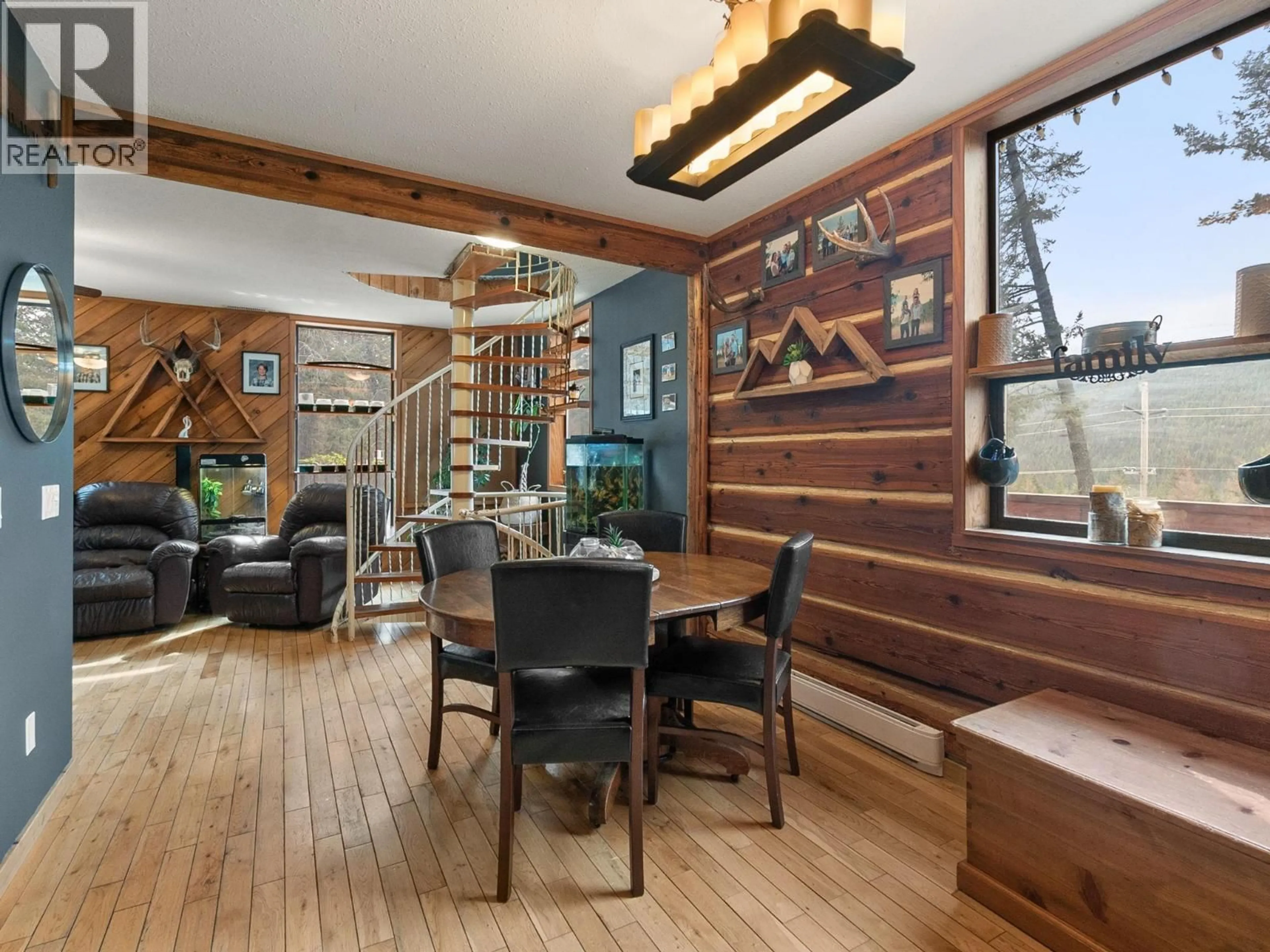 Dining room, wood/laminate floor for 1809 CARDINAL CREEK ROAD, Kelowna British Columbia V1P1J3